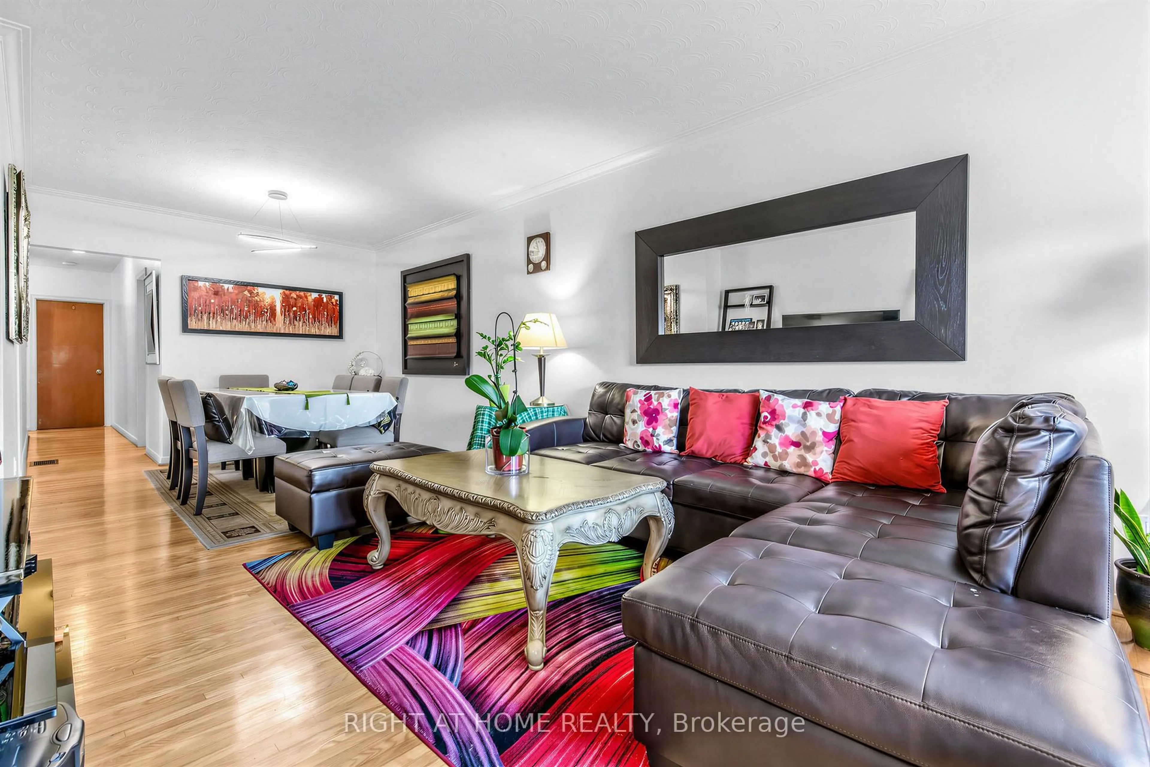 Living room with furniture, wood/laminate floor for 5 Thwaite Ave, Toronto Ontario M3L 2C8