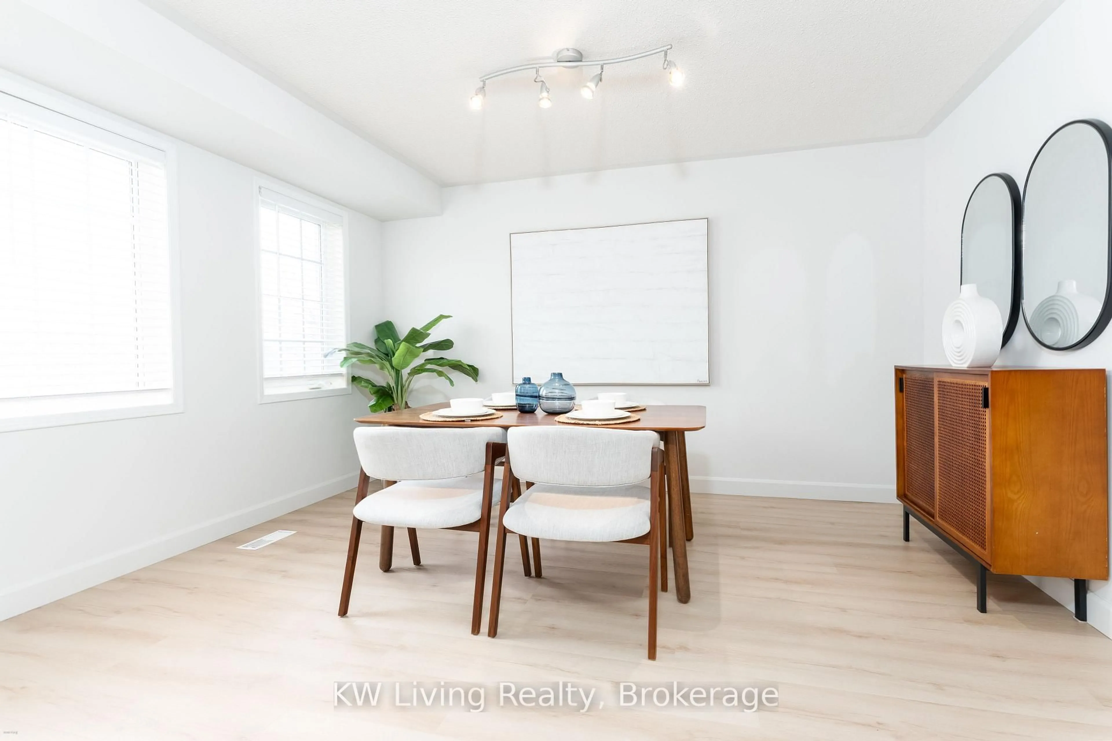 Dining room, wood/laminate floor for 180 Forum Dr #6, Mississauga Ontario L4Z 3Y2
