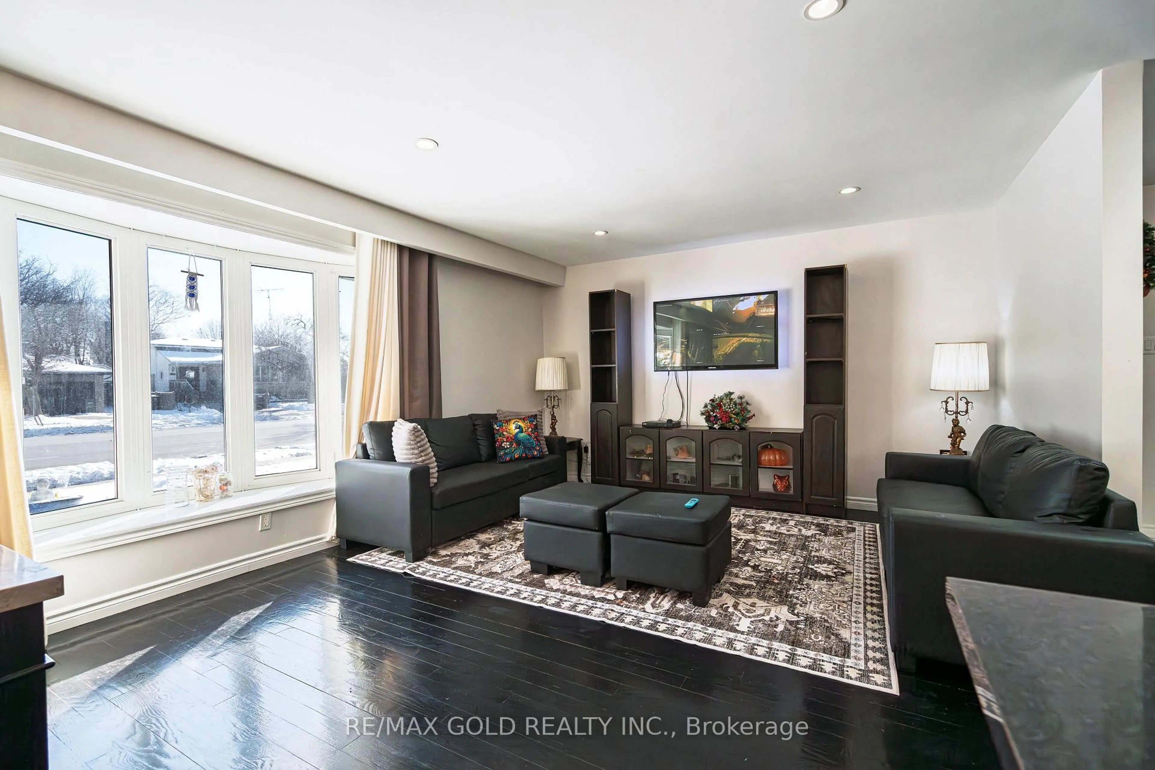 Living room with furniture, unknown for 46 Elgin Dr, Brampton Ontario L6Y 1A8