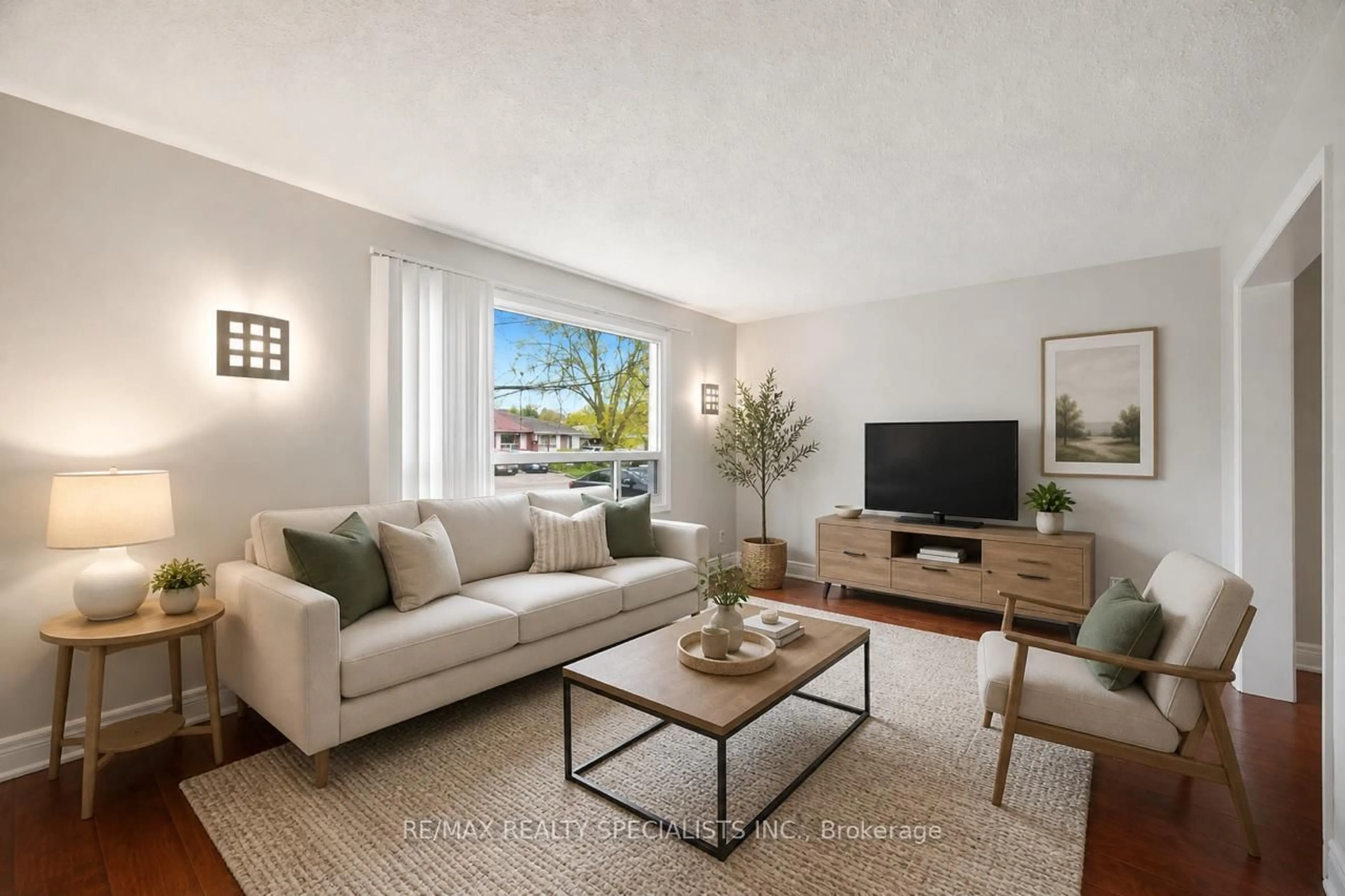 Living room with furniture, unknown for 13 Heggie Rd, Brampton Ontario L6V 2K2