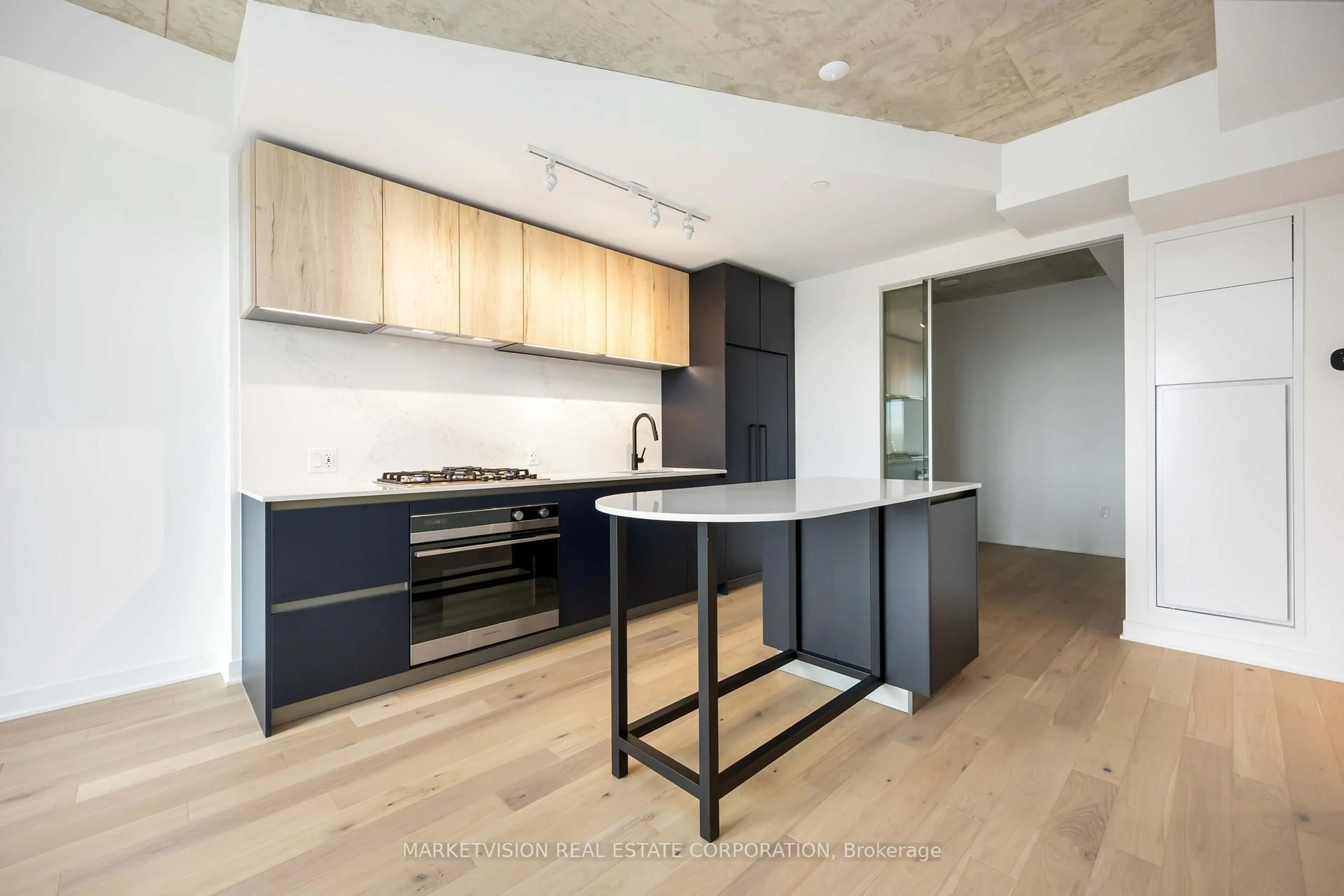 Open concept kitchen, unknown for 2625 Dundas St #610, Toronto Ontario M6P 0C5