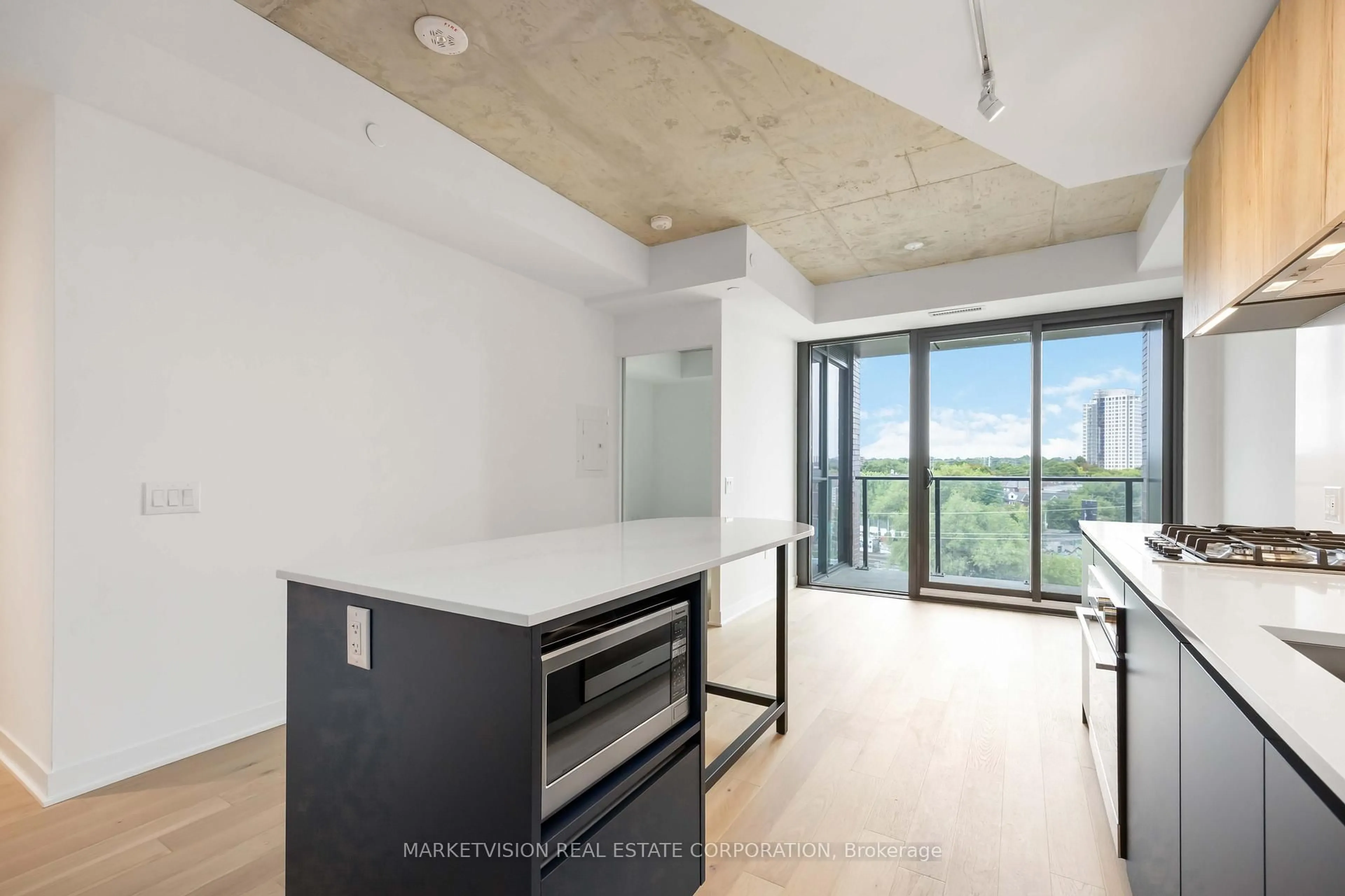 Open concept kitchen, unknown for 2625 Dundas St #610, Toronto Ontario M6P 0C5