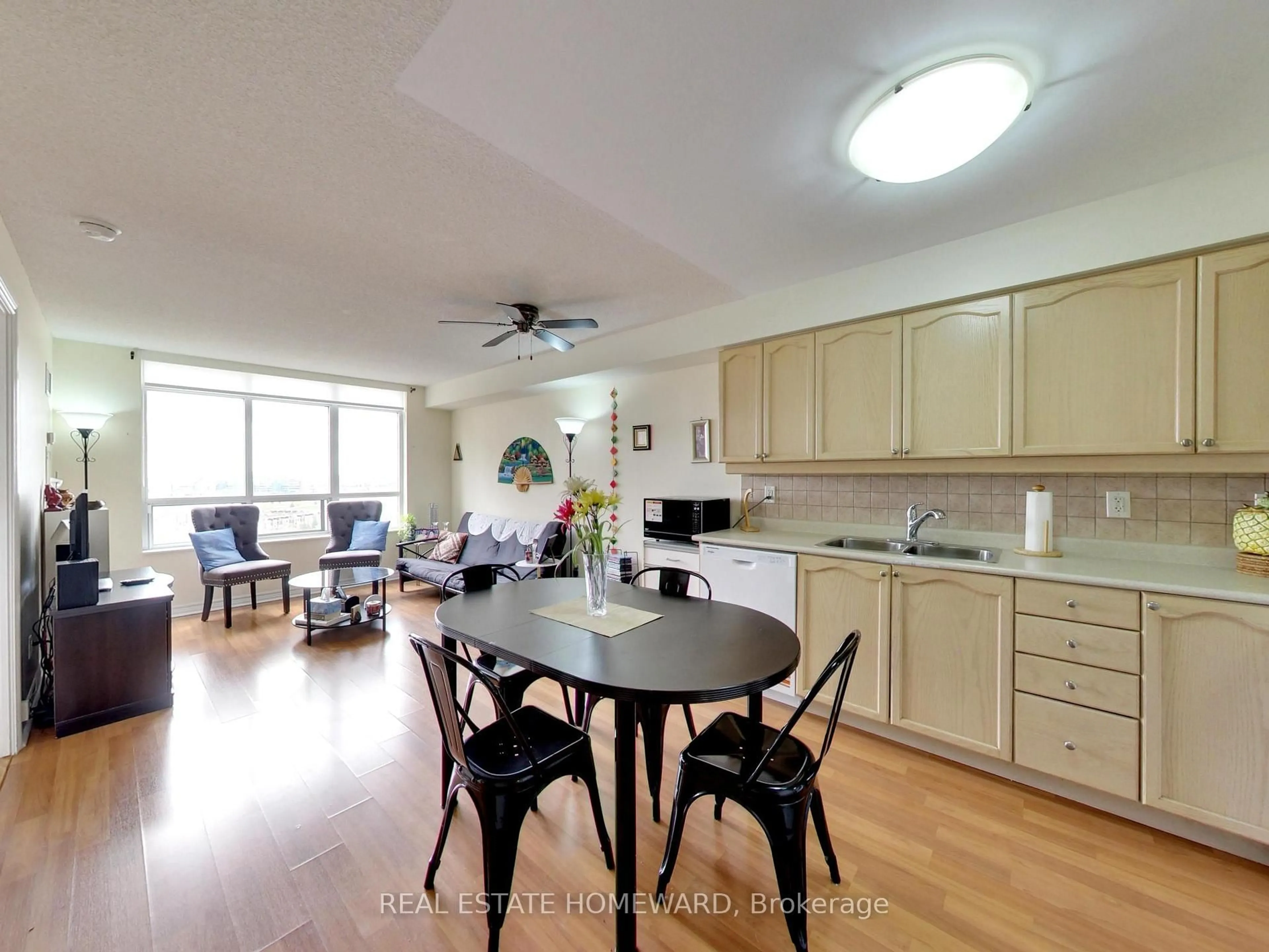 Open concept kitchen, wood/laminate floor for 710 Humberwood Blvd #2010, Toronto Ontario M9W 7J5