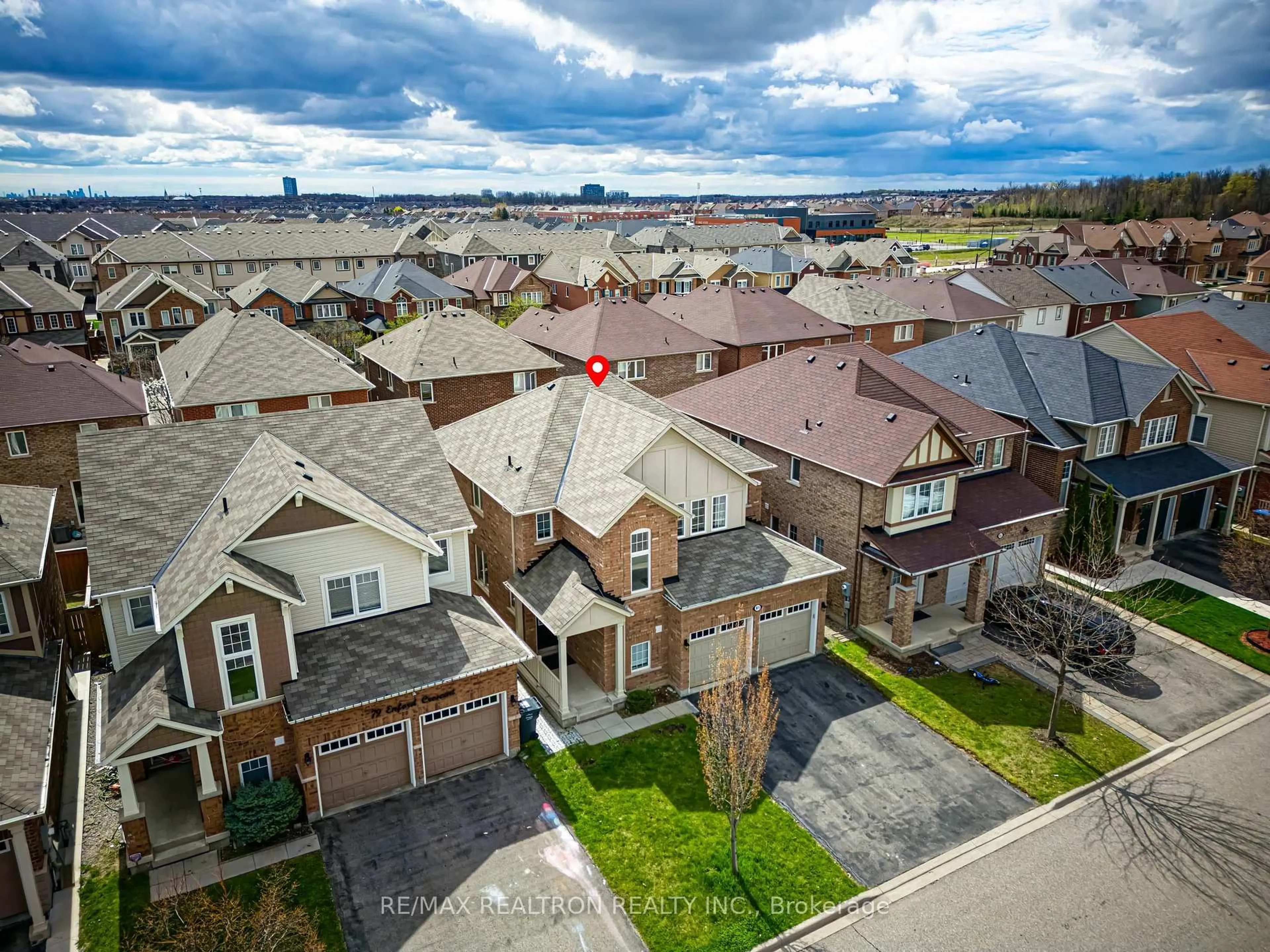 A pic from outside/outdoor area/front of a property/back of a property/a pic from drone, street for 81 Enford Cres, Brampton Ontario L7A 4C8