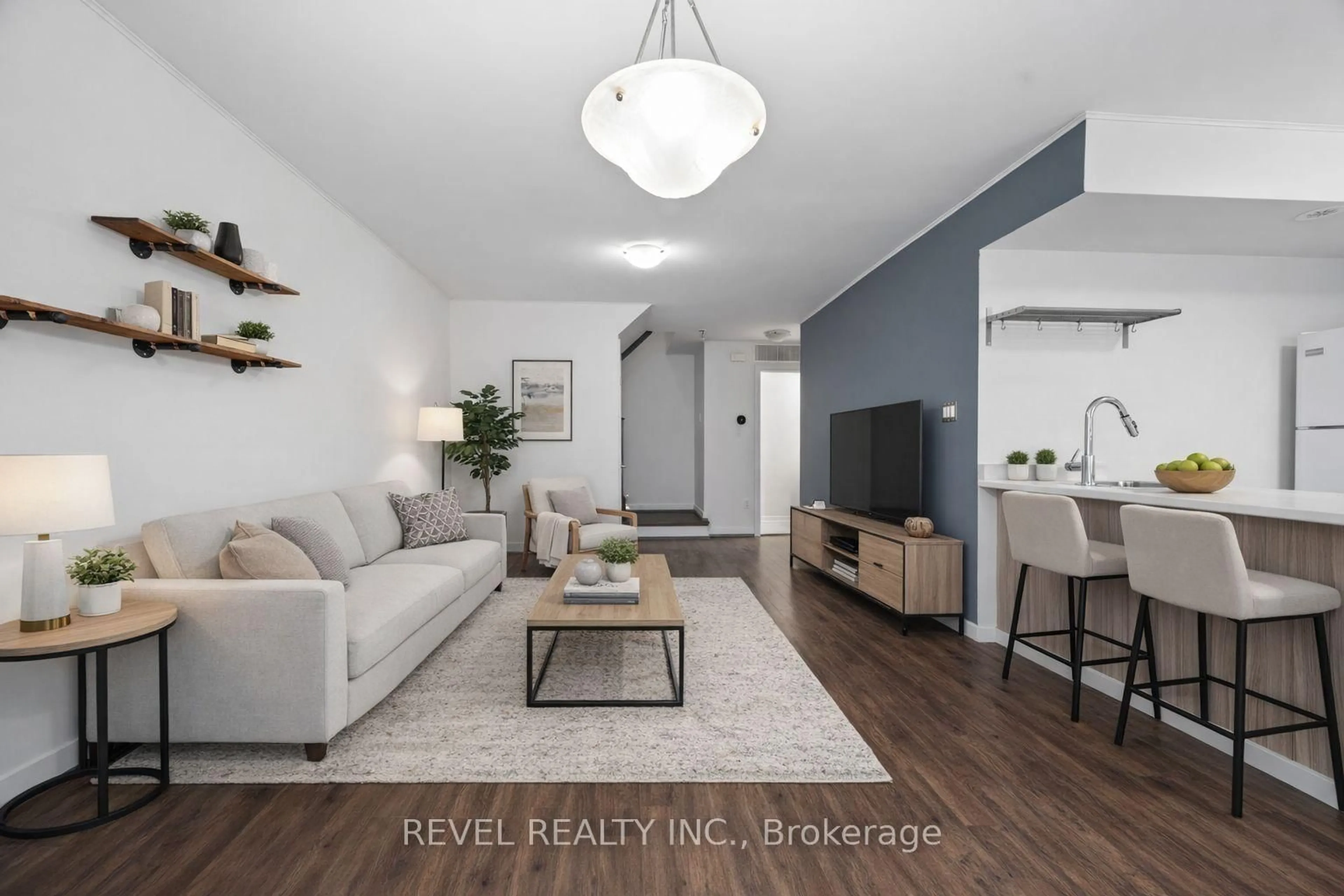 Living room with furniture, wood/laminate floor for 2315 Sheppard Ave #57, Toronto Ontario M9M 0E8