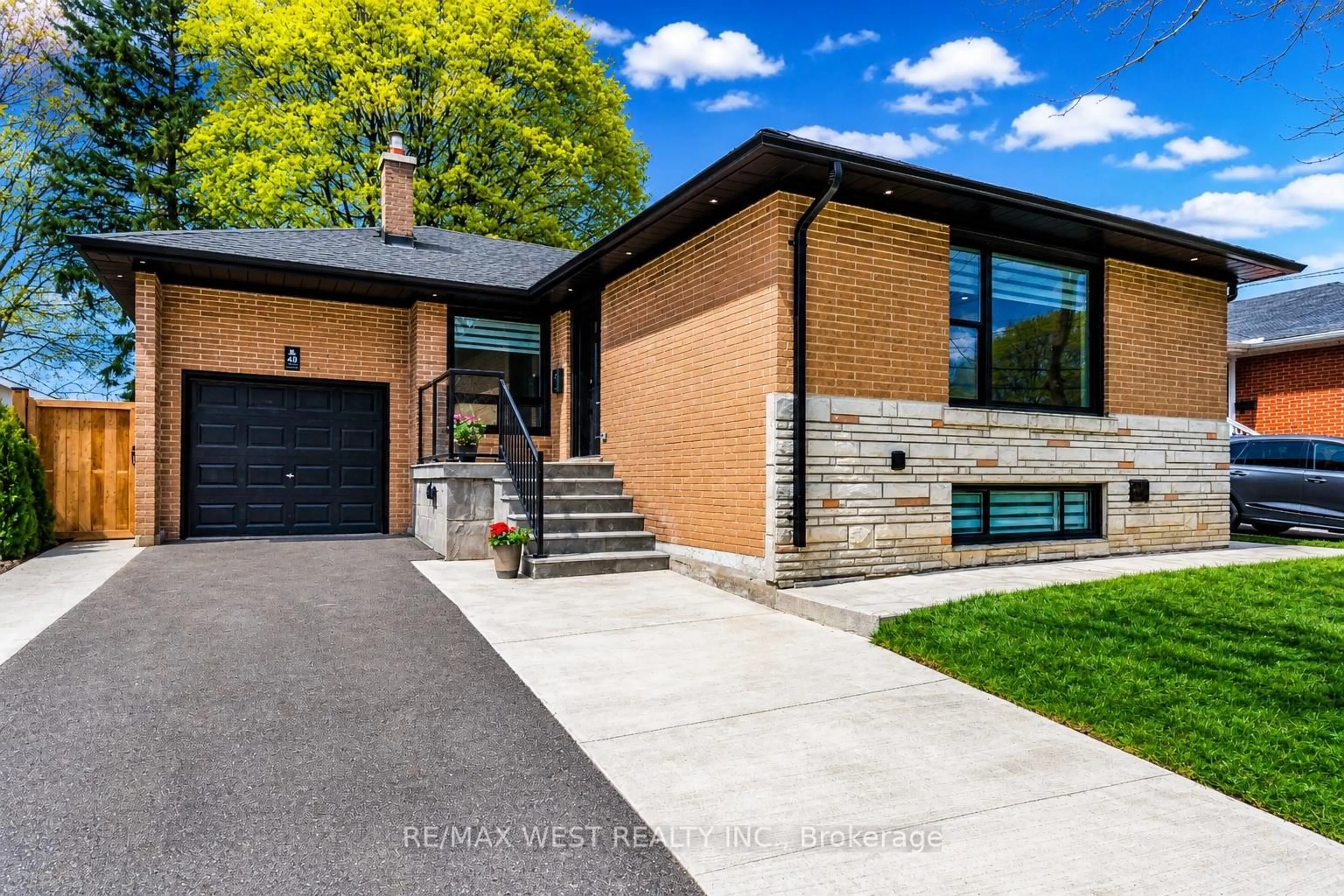 Home with brick exterior material, street for 48 Lloyd Manor Rd, Toronto Ontario M9B 5H7