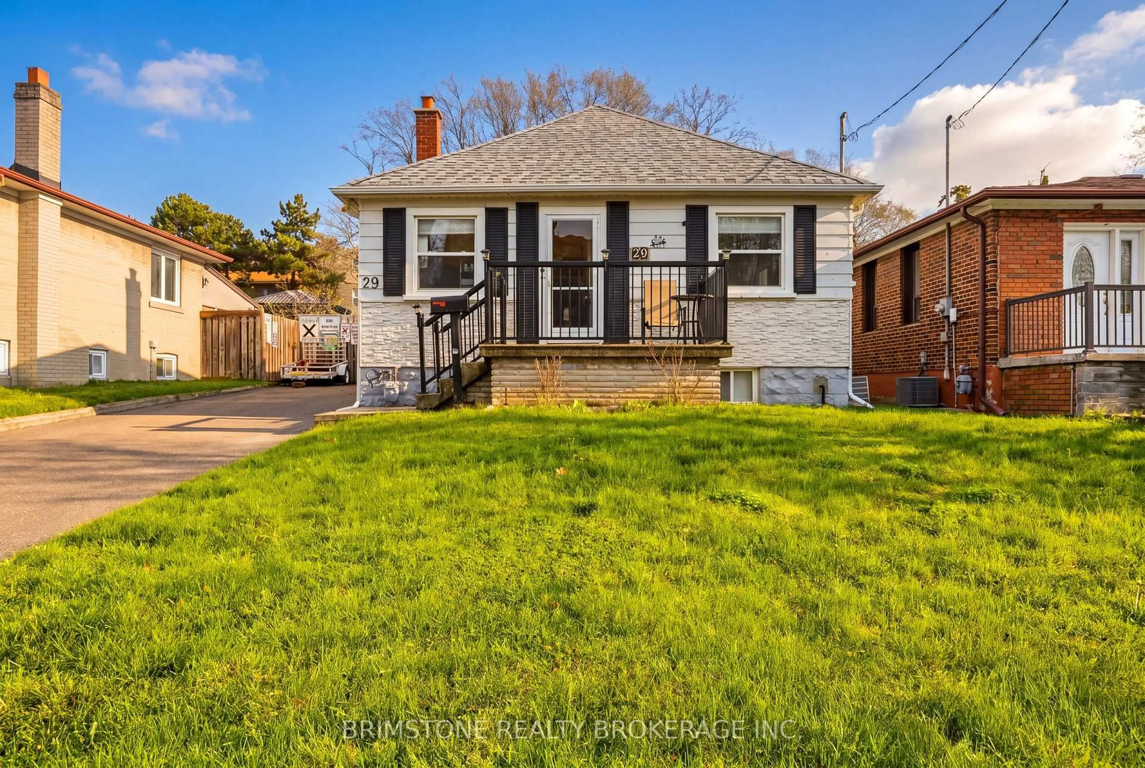 Home with brick exterior material, street for 29 Ridge Rd, Toronto Ontario M3M 1C6