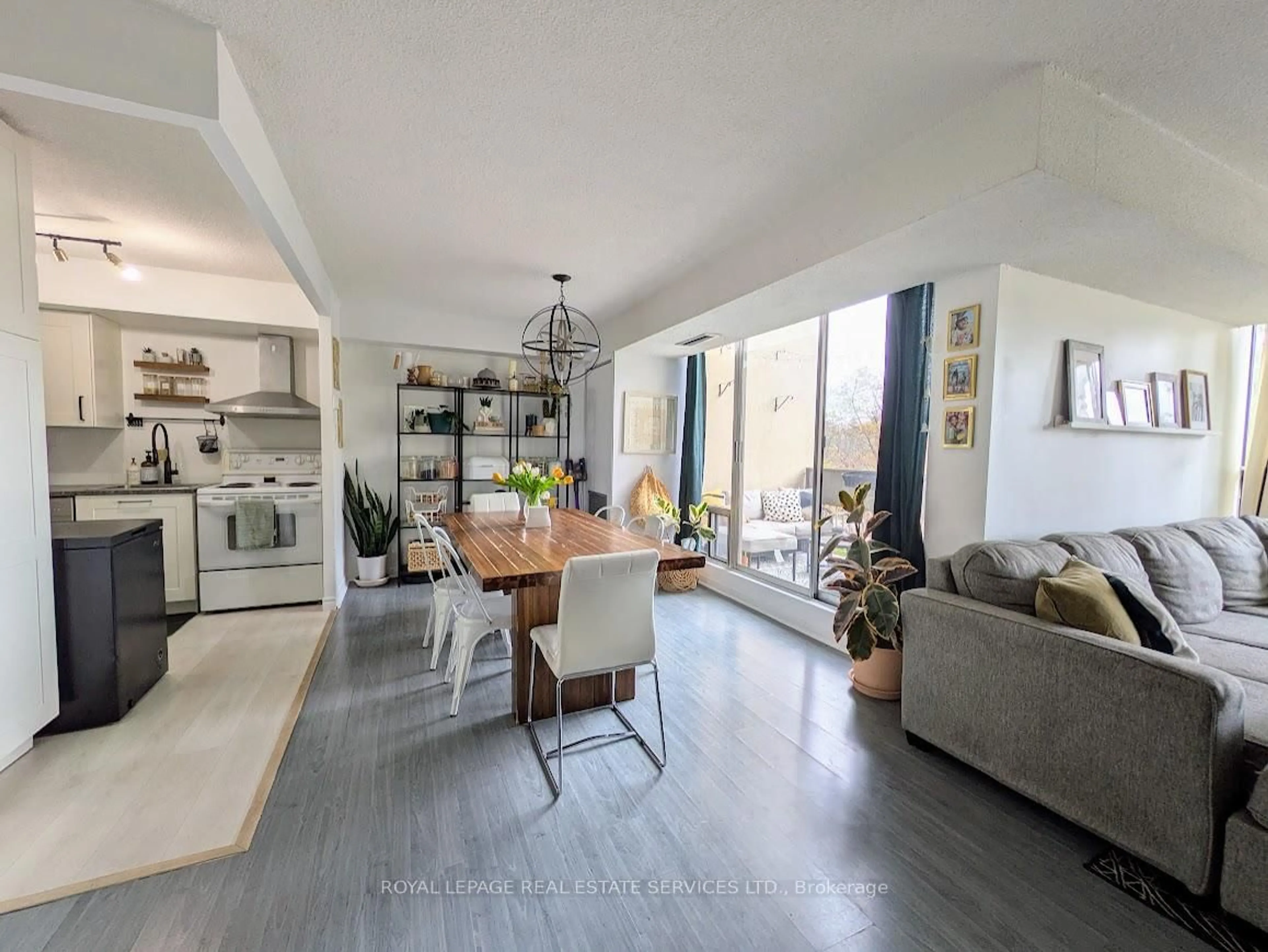 Living room with furniture, unknown for 1300 Marlborough Crt #325, Oakville Ontario L6H 2S2