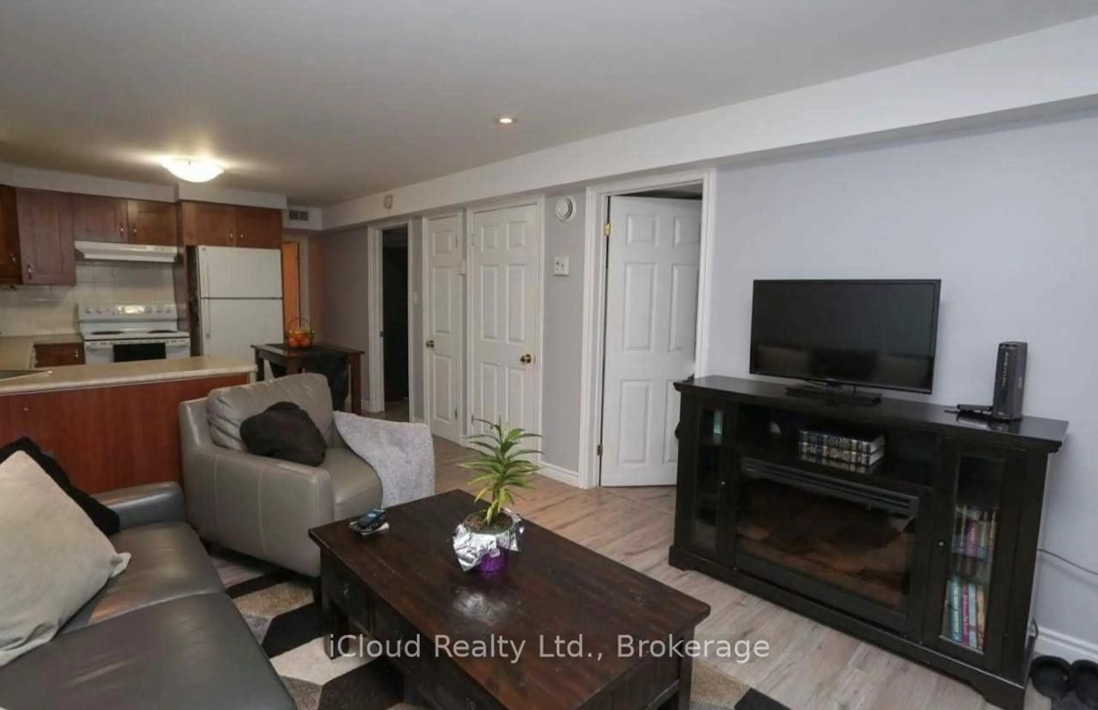 Living room with furniture, wood/laminate floor for 85 Elizabeth St, Orangeville Ontario L9W 1C7