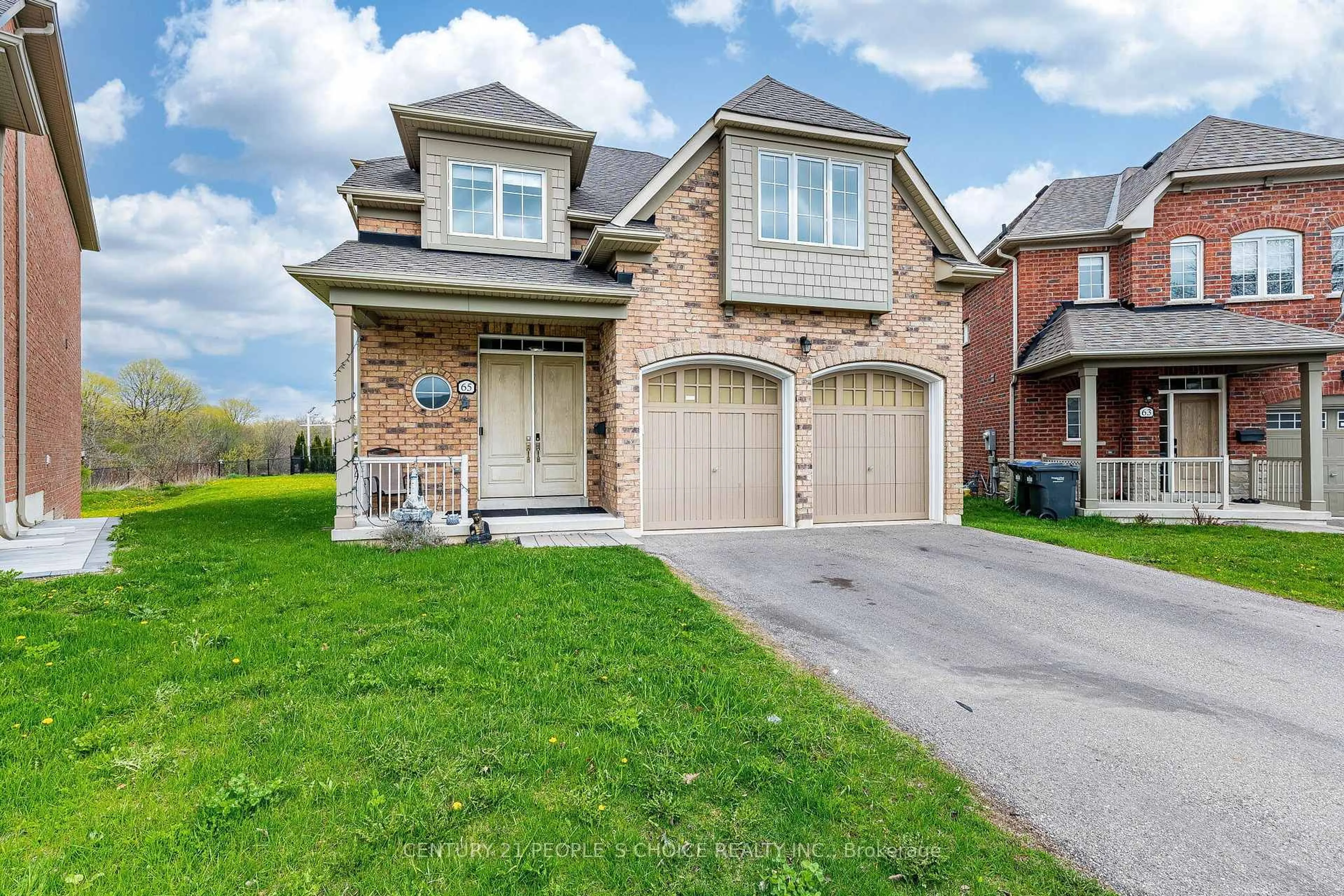 Home with brick exterior material, street for 65 Honeyview Tr, Brampton Ontario L6P 4A4