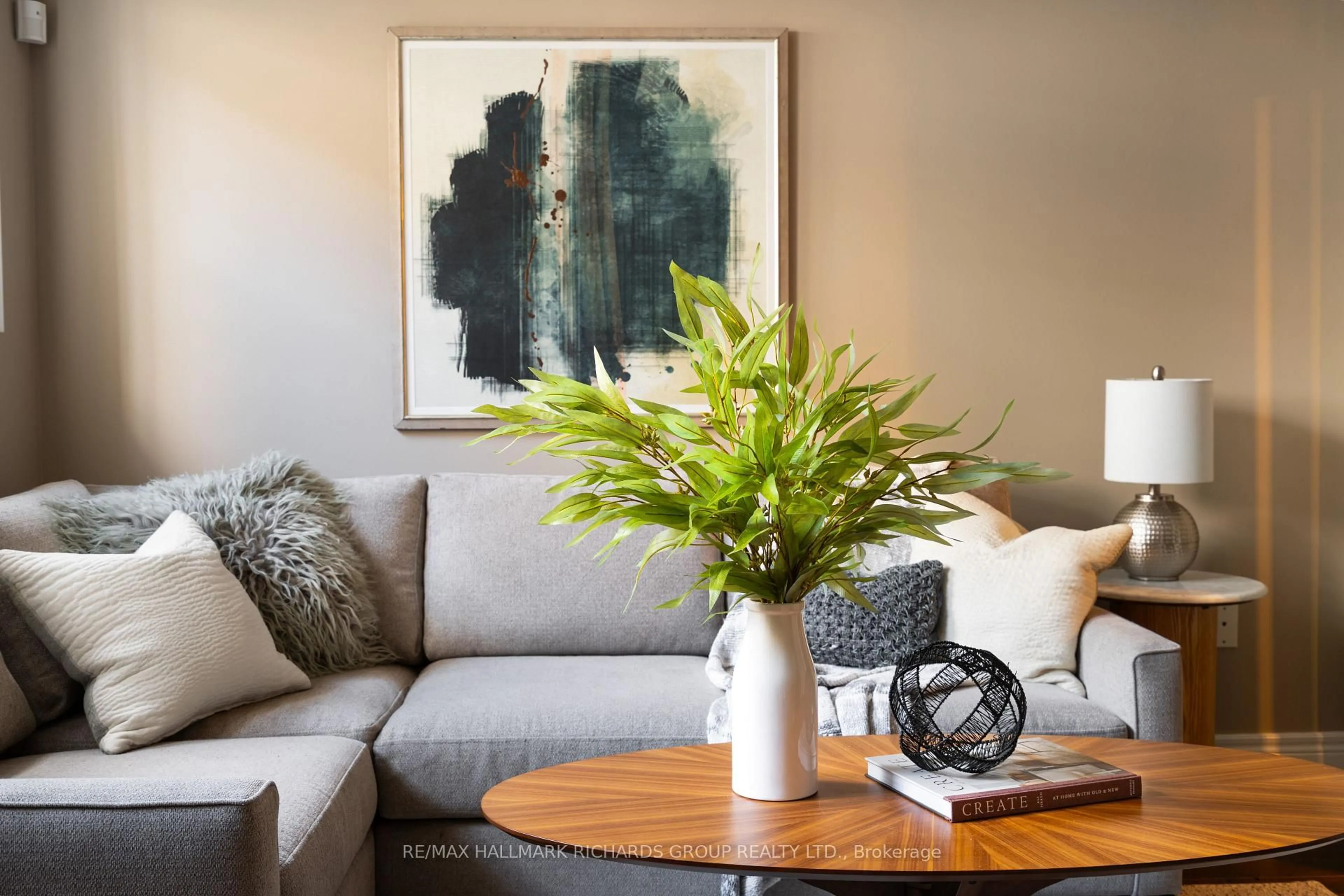 Living room with furniture, wood/laminate floor for 35 Furrow Lane, Toronto Ontario M8Z 0A2