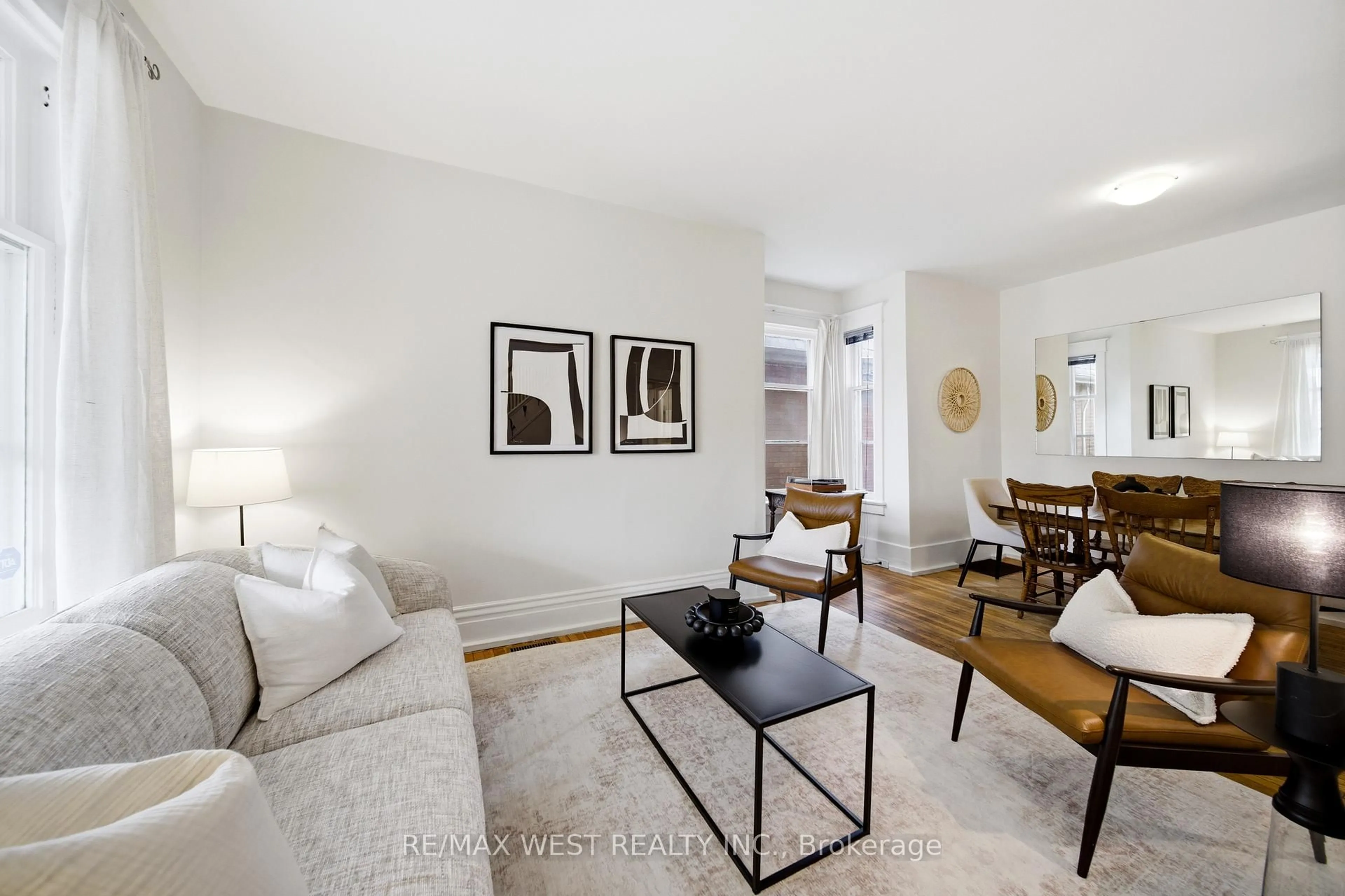 Living room with furniture, unknown for 201 Gilmour Ave, Toronto Ontario M6P 3B2