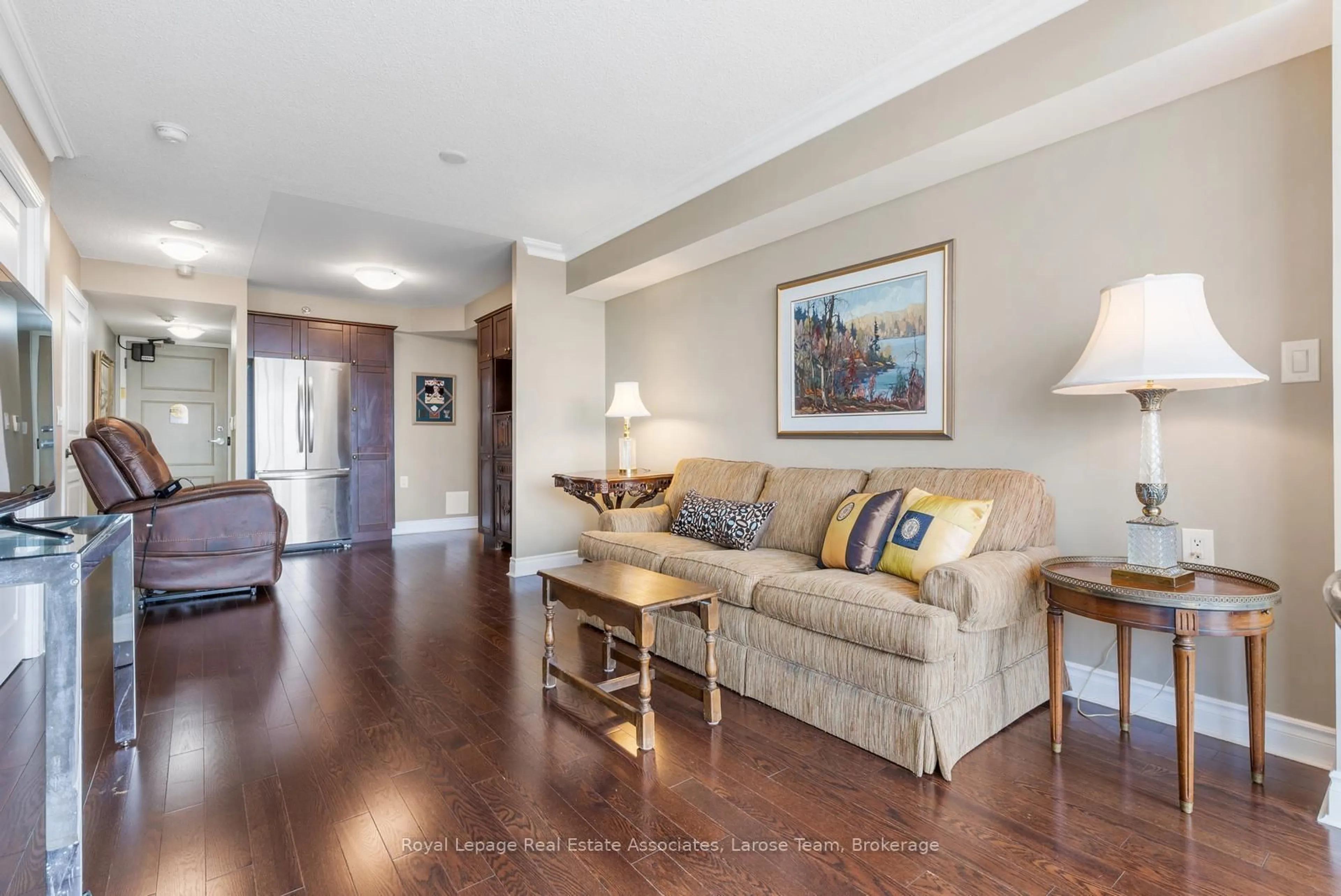Living room with furniture, wood/laminate floor for 3 Marine Parade Dr #1607, Toronto Ontario M8V 3Z5