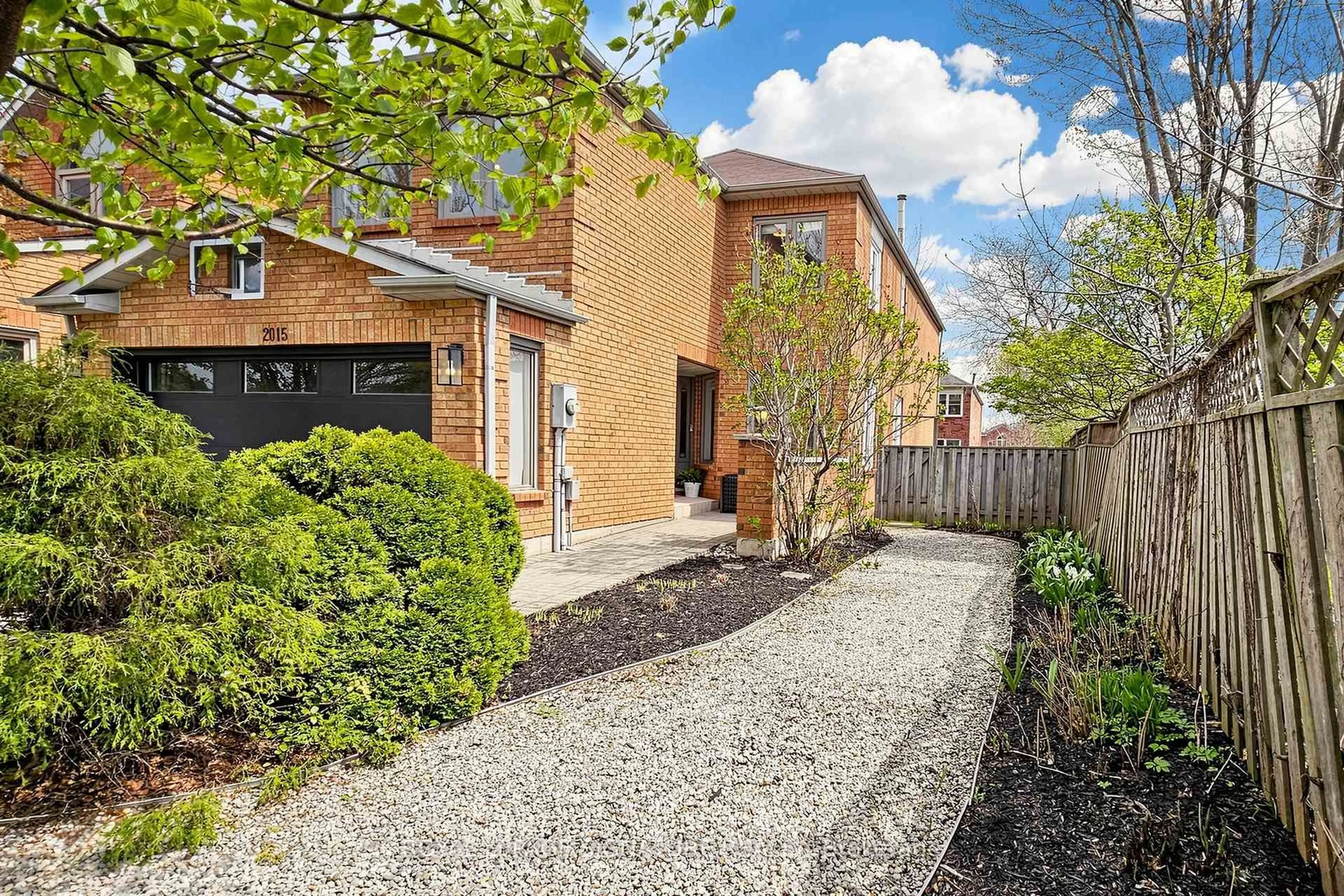 Home with brick exterior material, street for 2015 Brays Lane, Oakville Ontario L6M 2S8