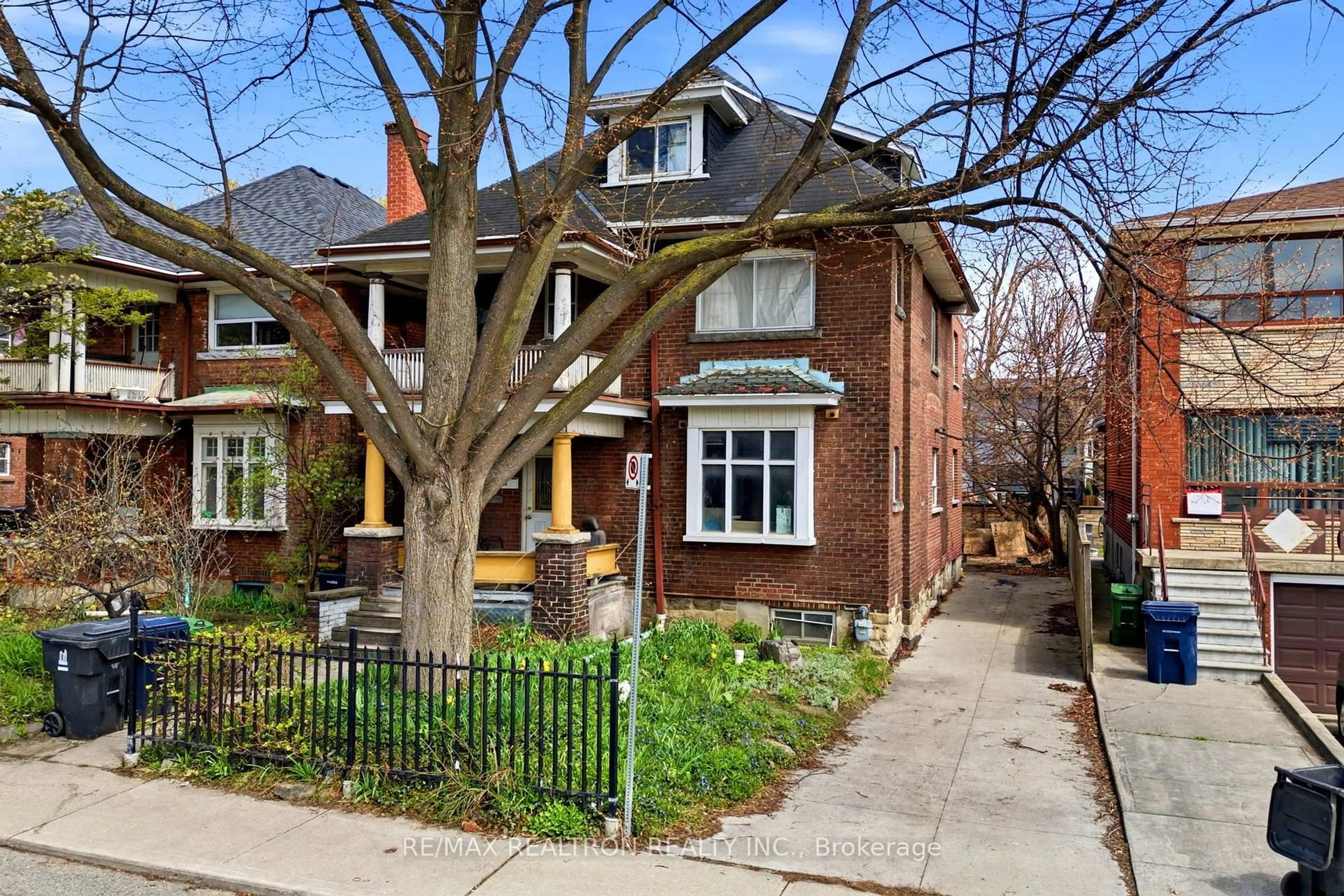 Home with brick exterior material, street for 19 Emerson Ave, Toronto Ontario M6H 3S7