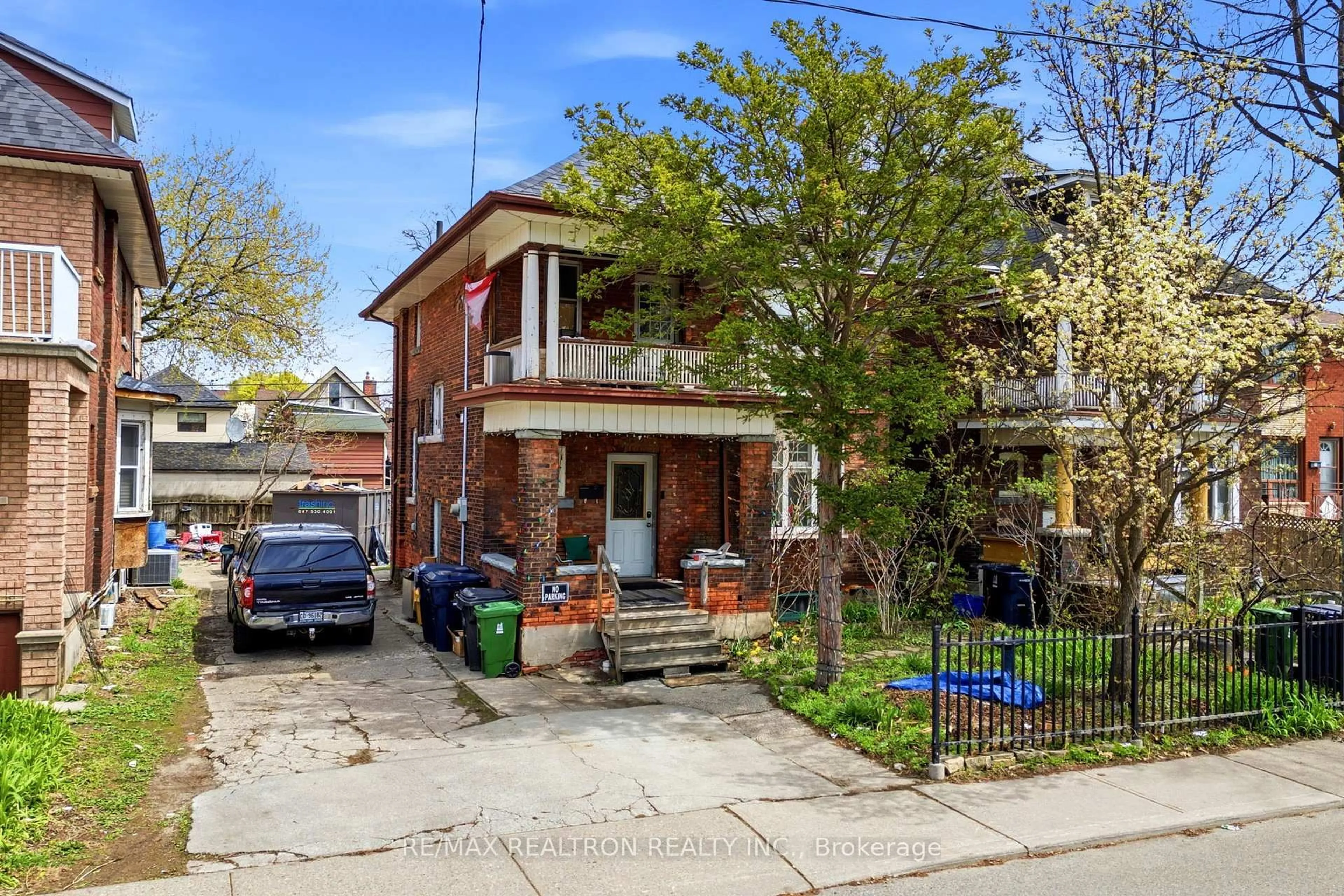 Home with brick exterior material, street for 21 Emerson Ave, Toronto Ontario M6H 3S7