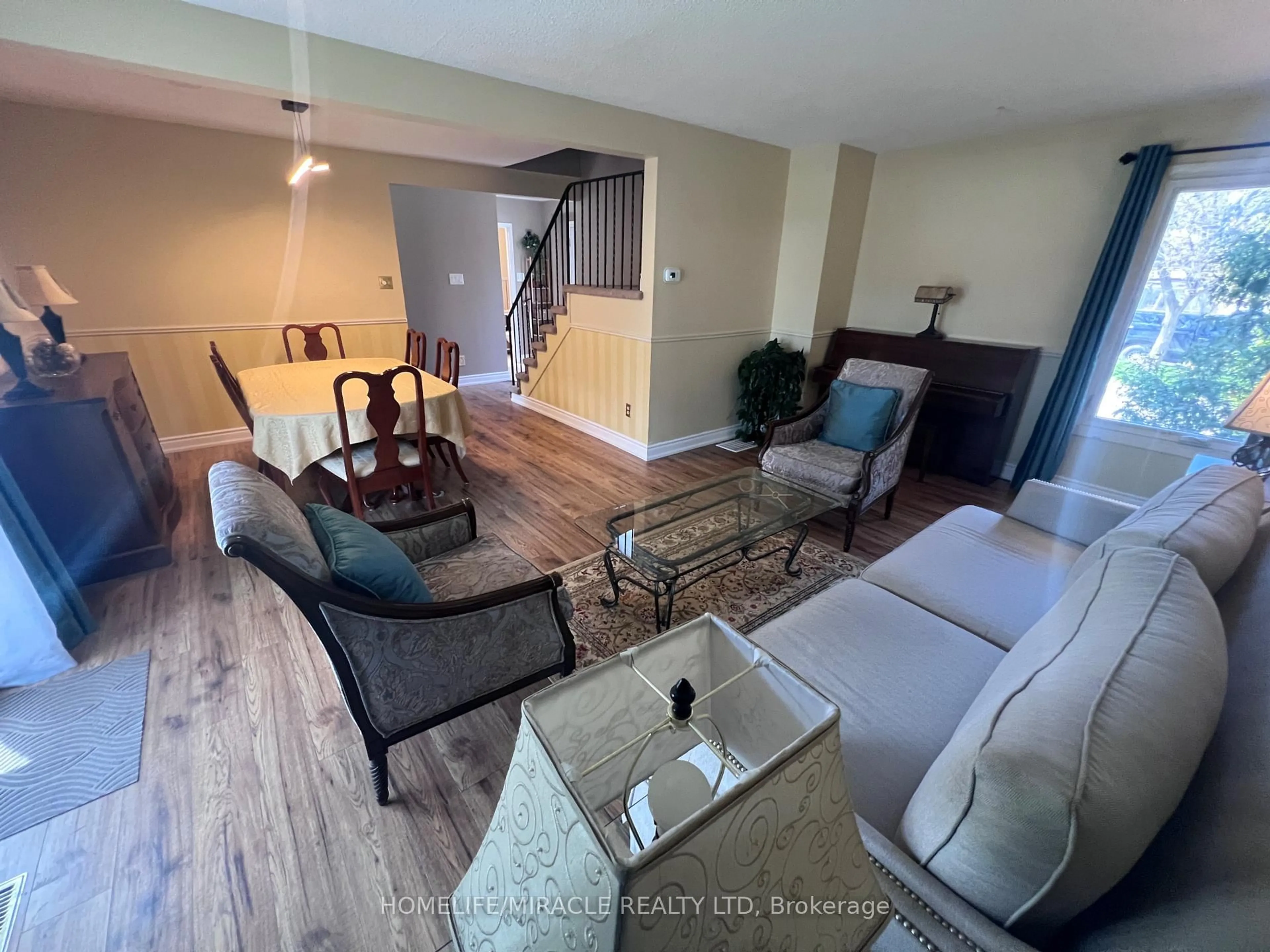 Living room with furniture, unknown for 59 Kenninghall Blvd #30, Mississauga Ontario L5N 1J6