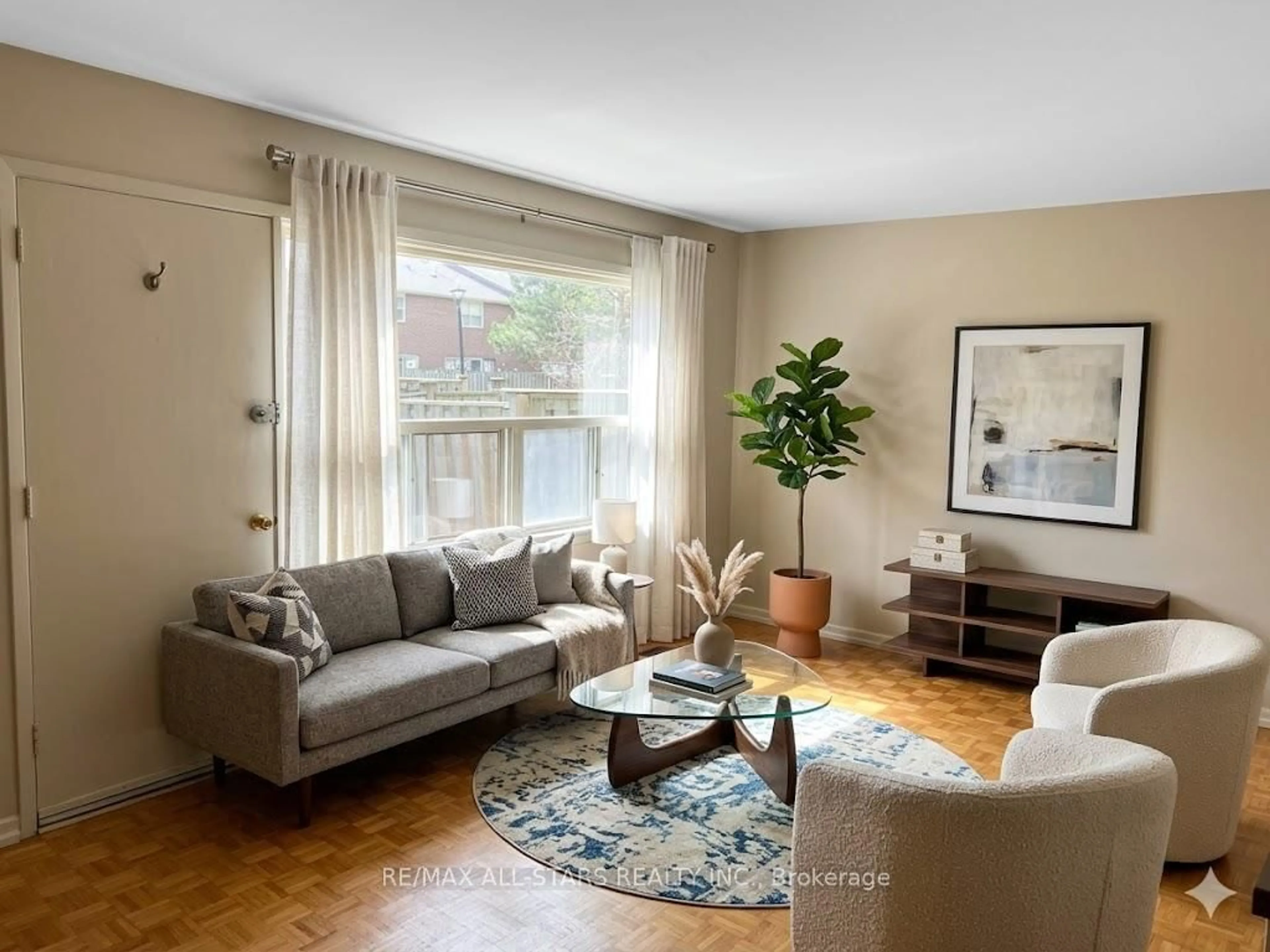 Living room with furniture, unknown for 61 Eden Park Dr, Brampton Ontario L6T 3A5