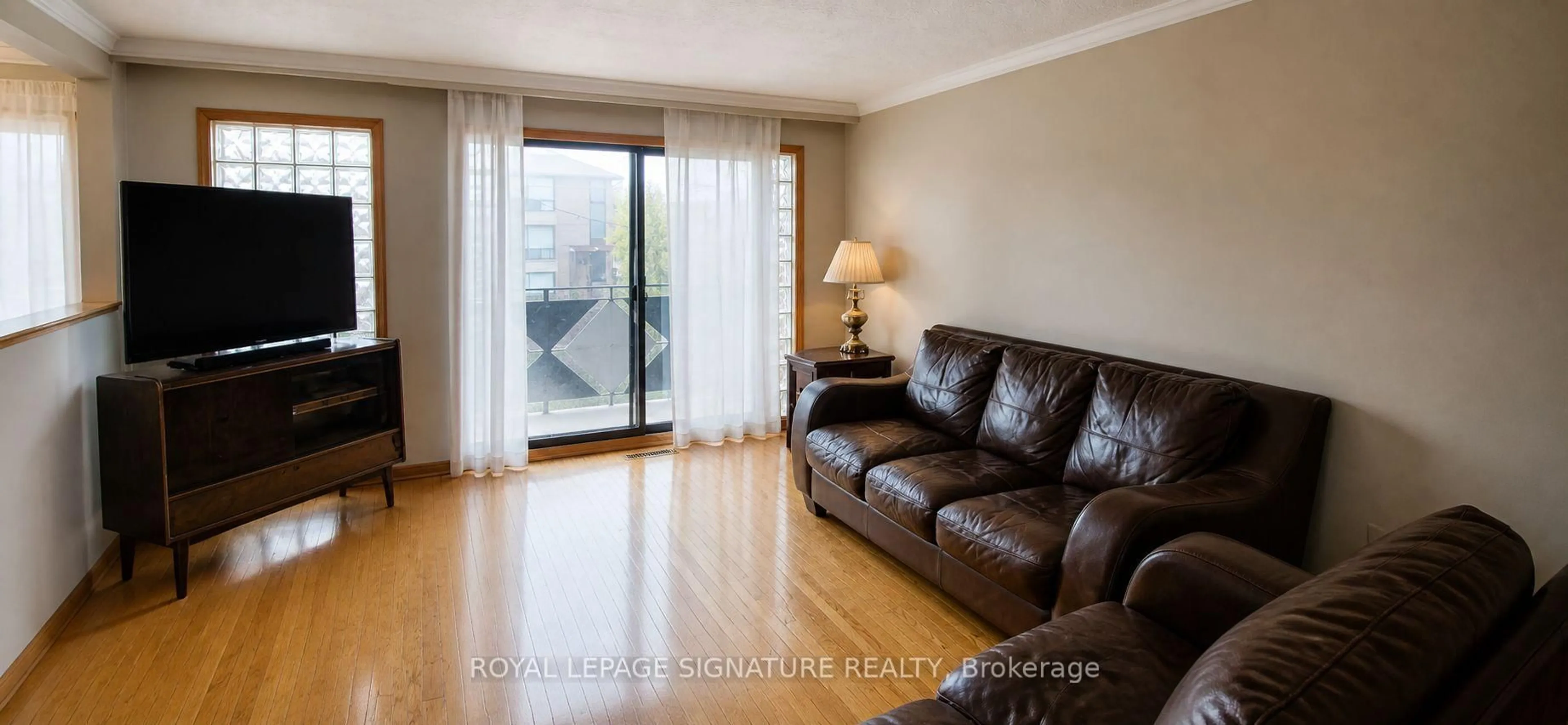 Living room with furniture, wood/laminate floor for 4 Imogene Ave, Toronto Ontario M9M 1N6