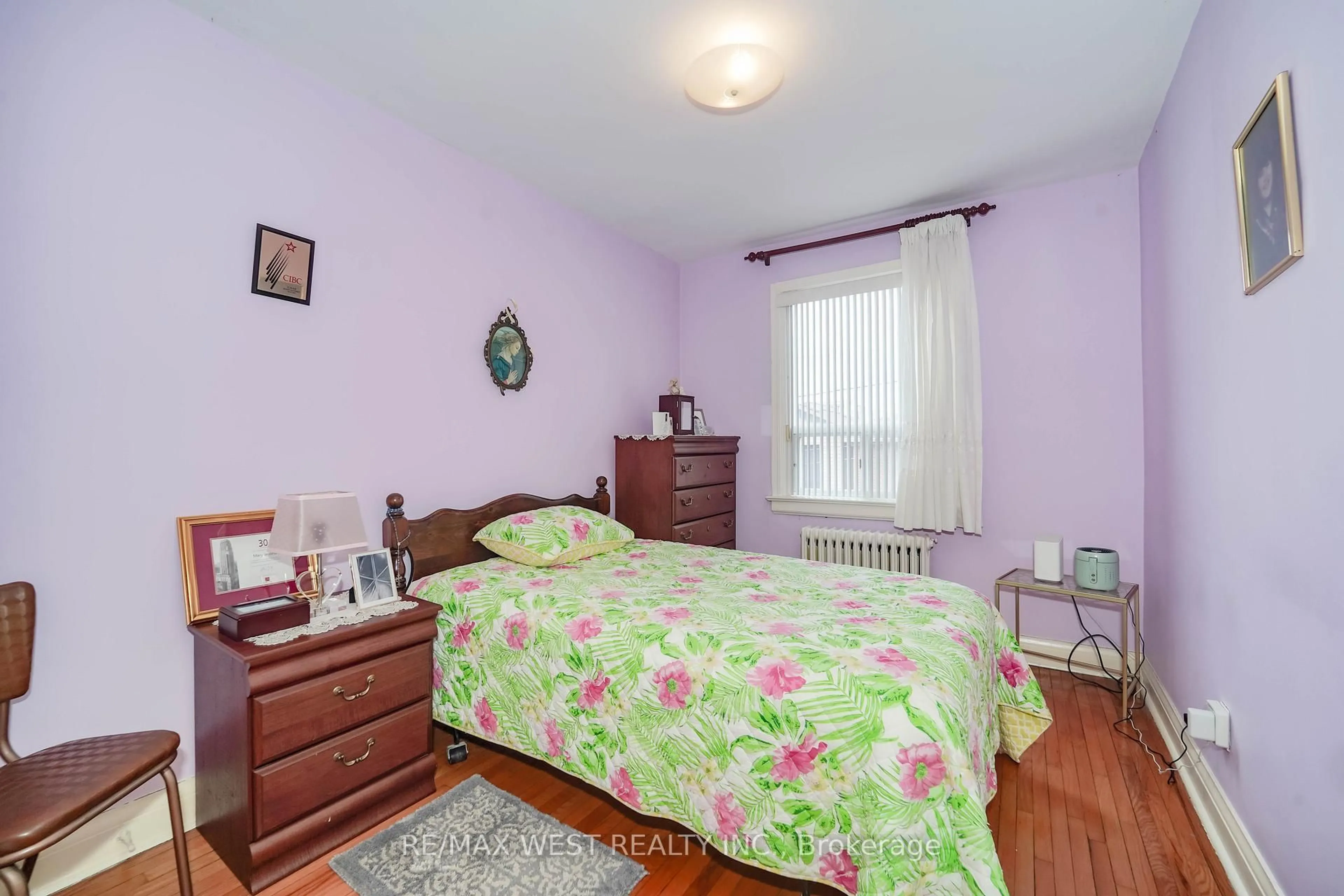 Bedroom with bed, wood/laminate floor for 617 Caledonia Rd, Toronto Ontario M6E 4V7