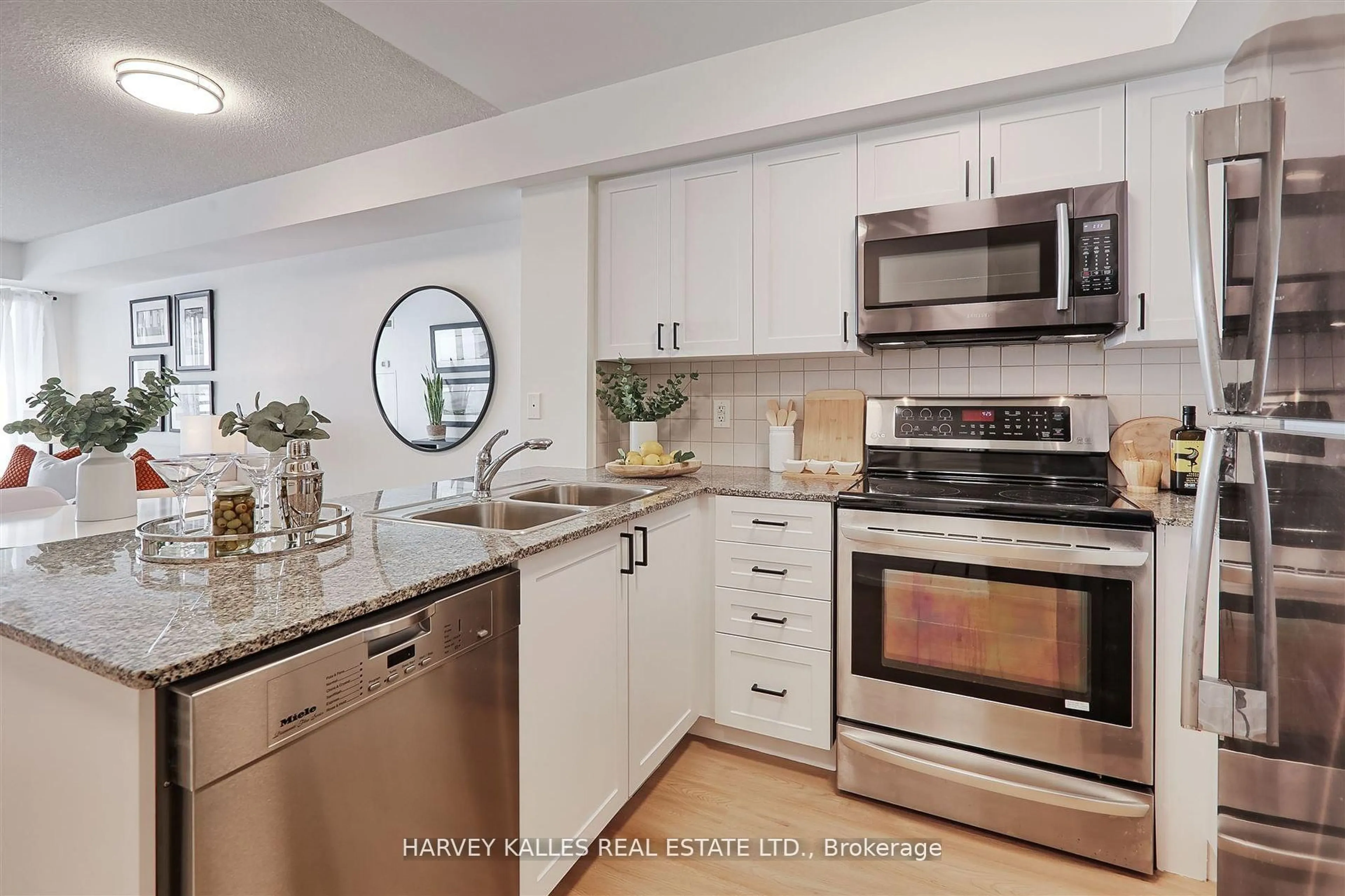 Open concept kitchen, ceramic/tile floor for 1070 Sheppard Ave #912, Toronto Ontario M3J 0G8