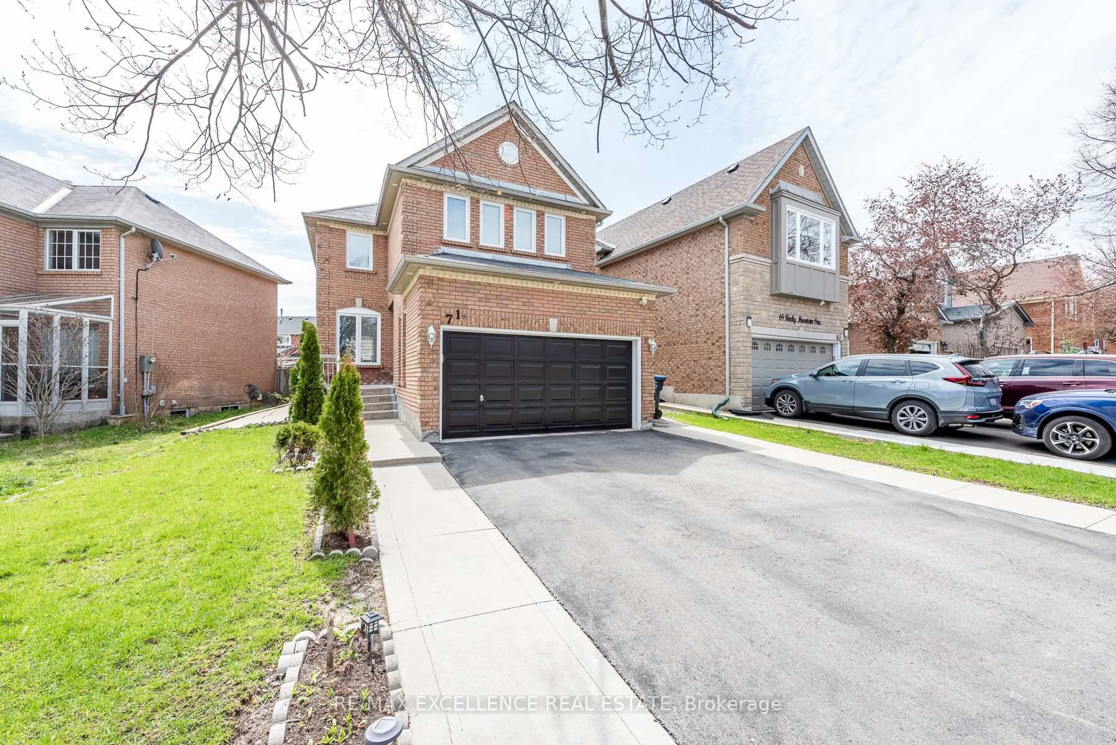 Home with brick exterior material, street for 71 Rocky Mountain Cres, Brampton Ontario L6R 1E7