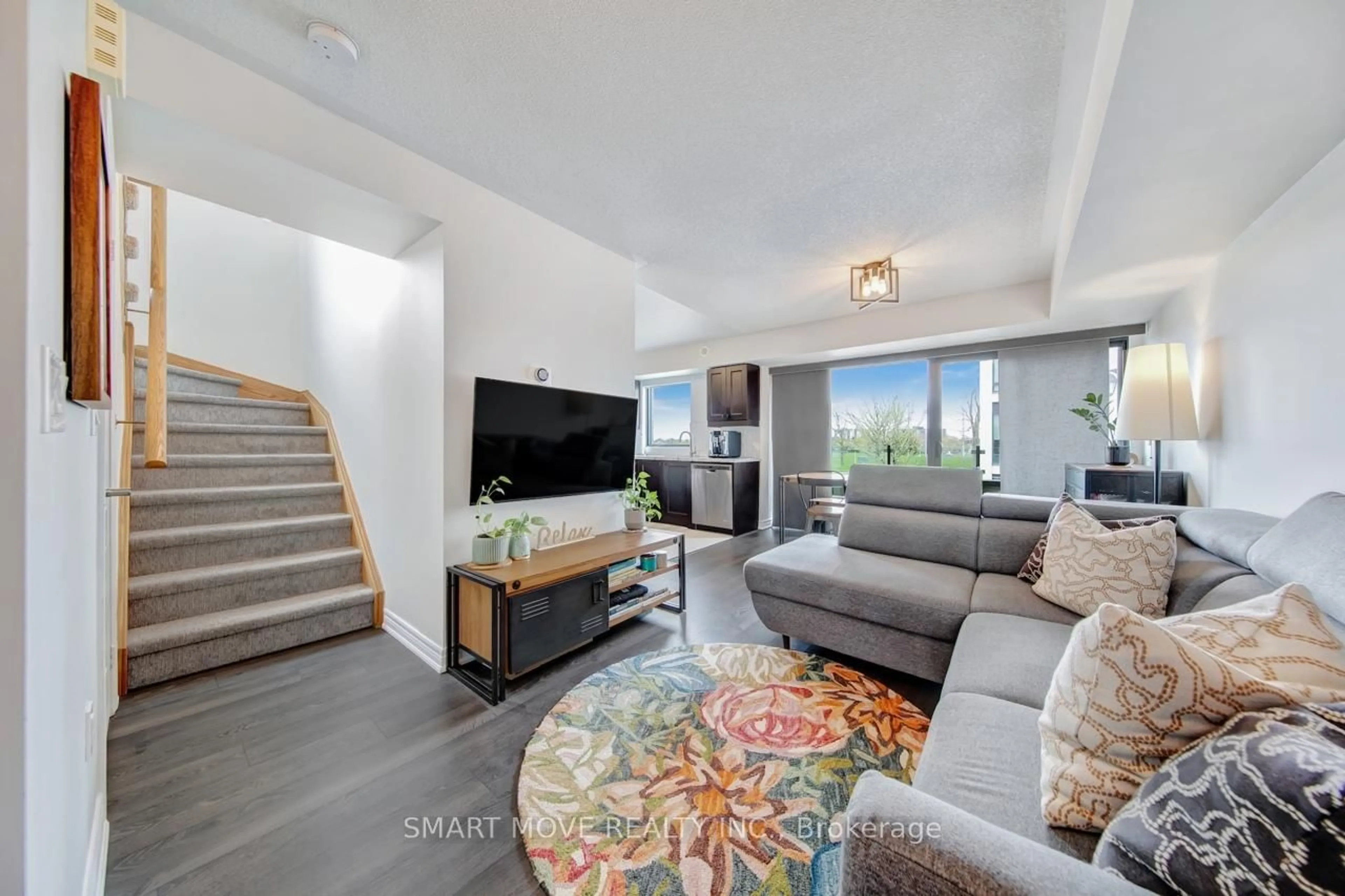 Living room with furniture, unknown for 138 Widdicombe Hill Blvd #716, Toronto Ontario M9R 0A9