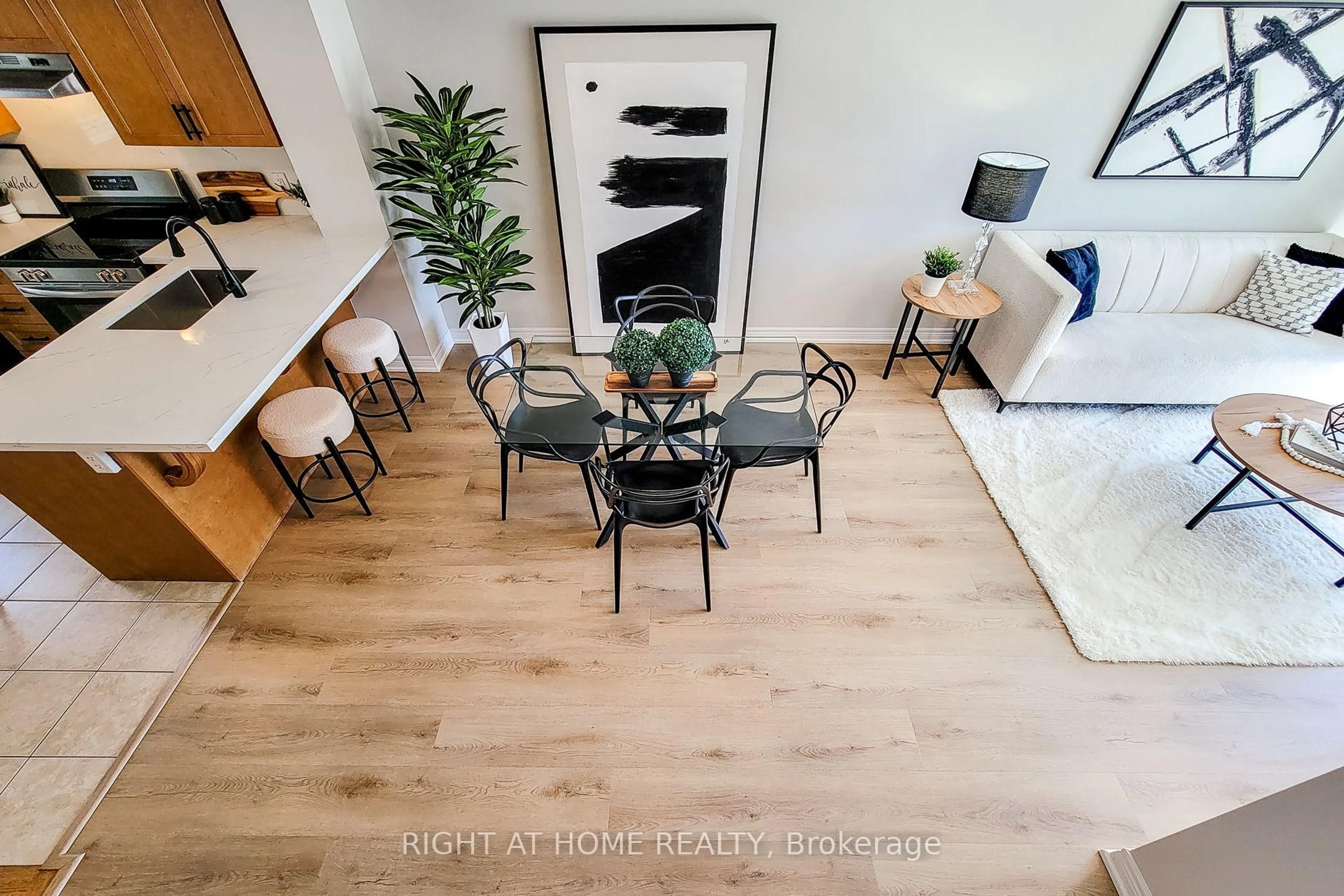 Dining room, wood/laminate floor for 1380 Costigan Rd #33, Milton Ontario L9T 8L2