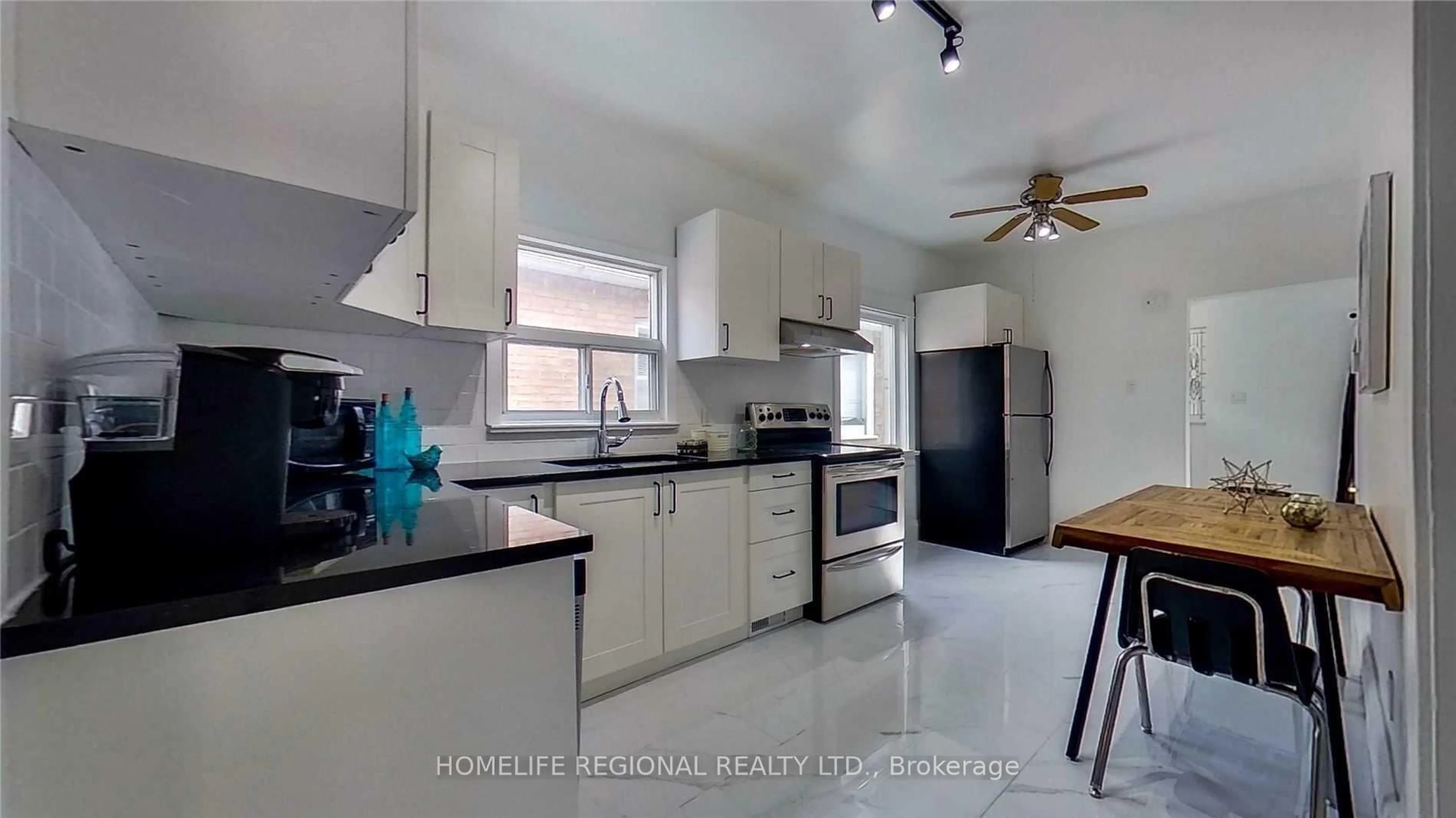 Open concept kitchen, ceramic/tile floor for 22 Criscoe St, Toronto Ontario M6N 3Y9