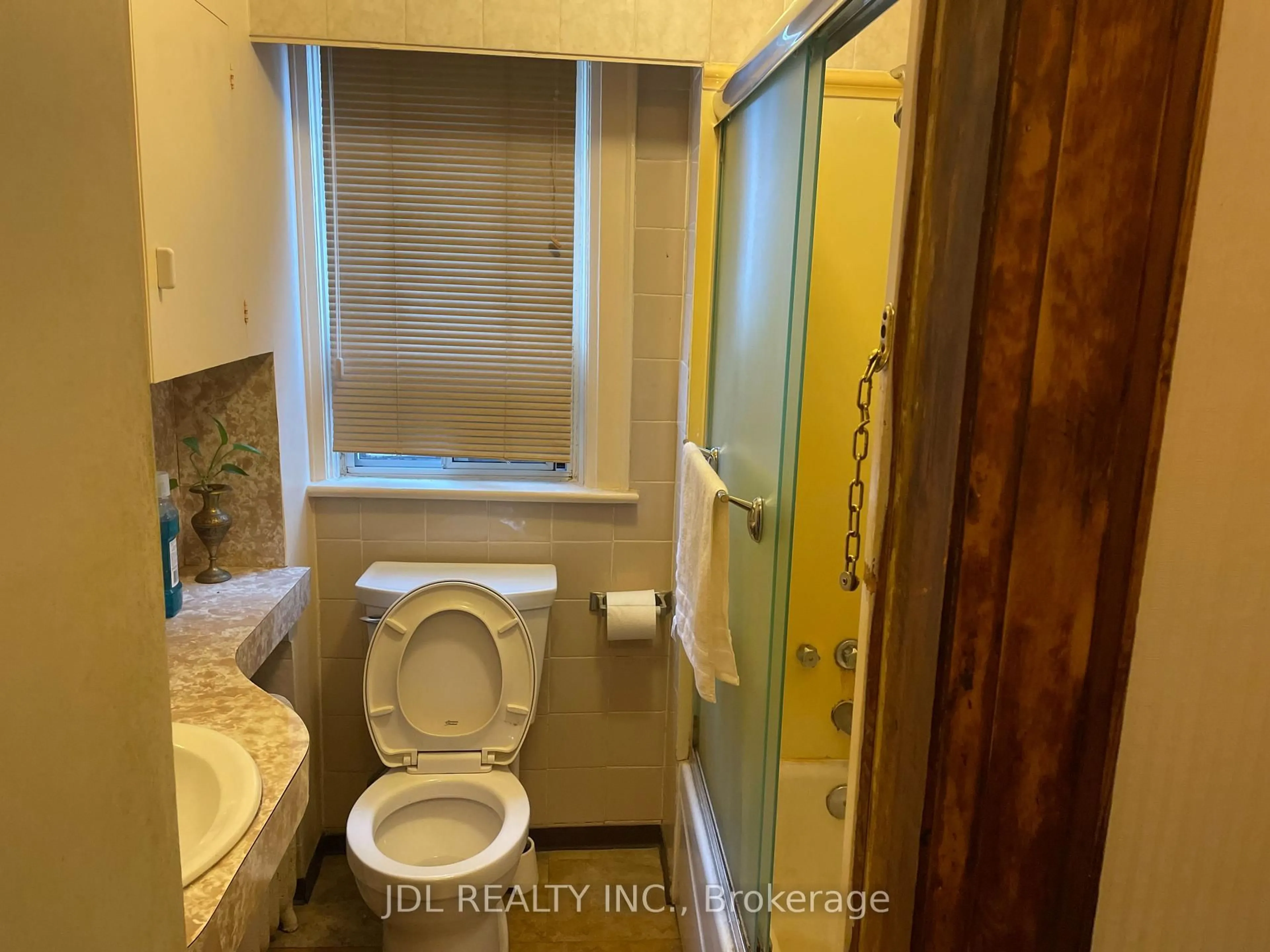 Standard bathroom, floor is not visible for 61 Guestville Ave, Toronto Ontario M6N 4N4