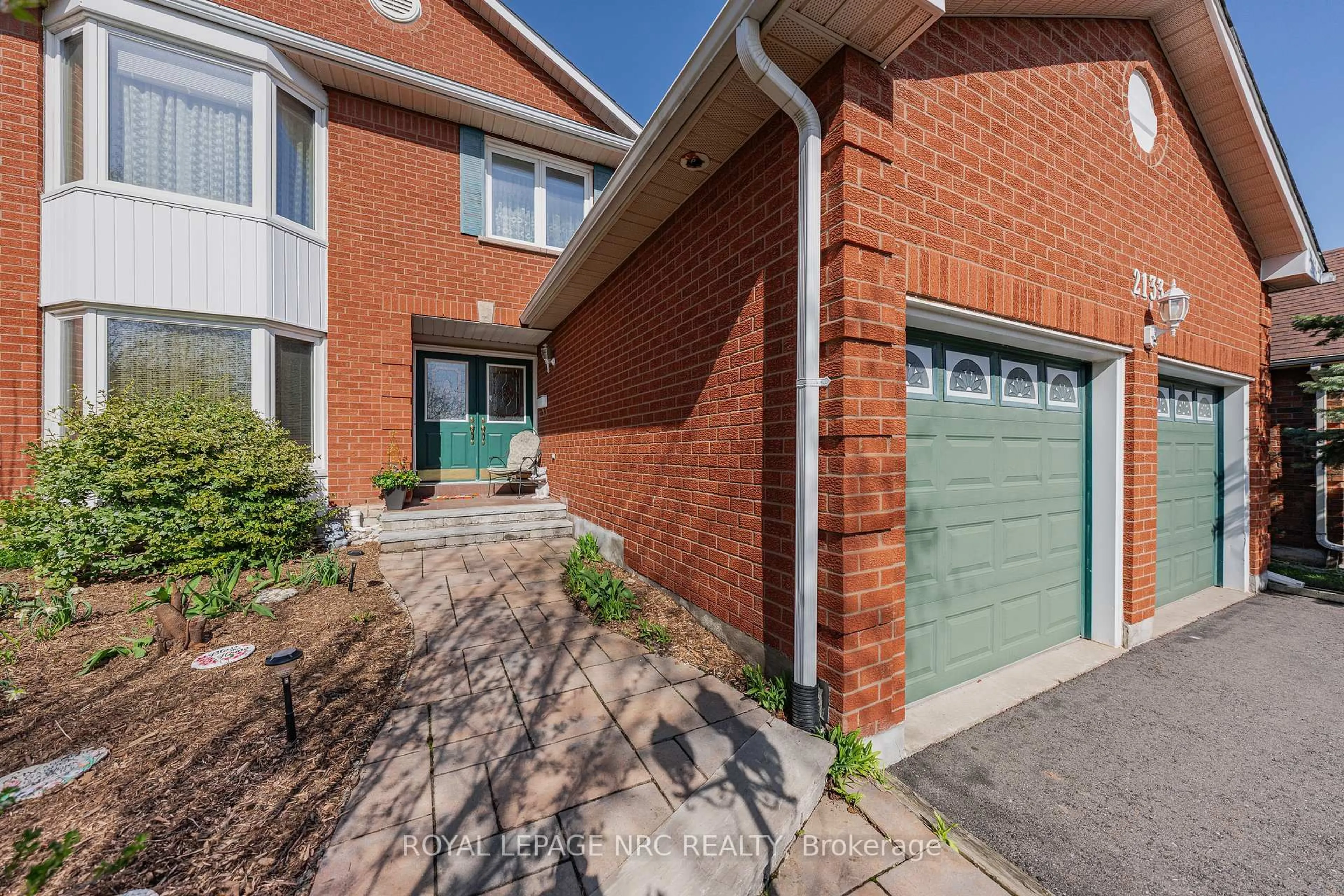 Home with brick exterior material, street for 2133 Grand Blvd, Oakville Ontario L6H 5M3
