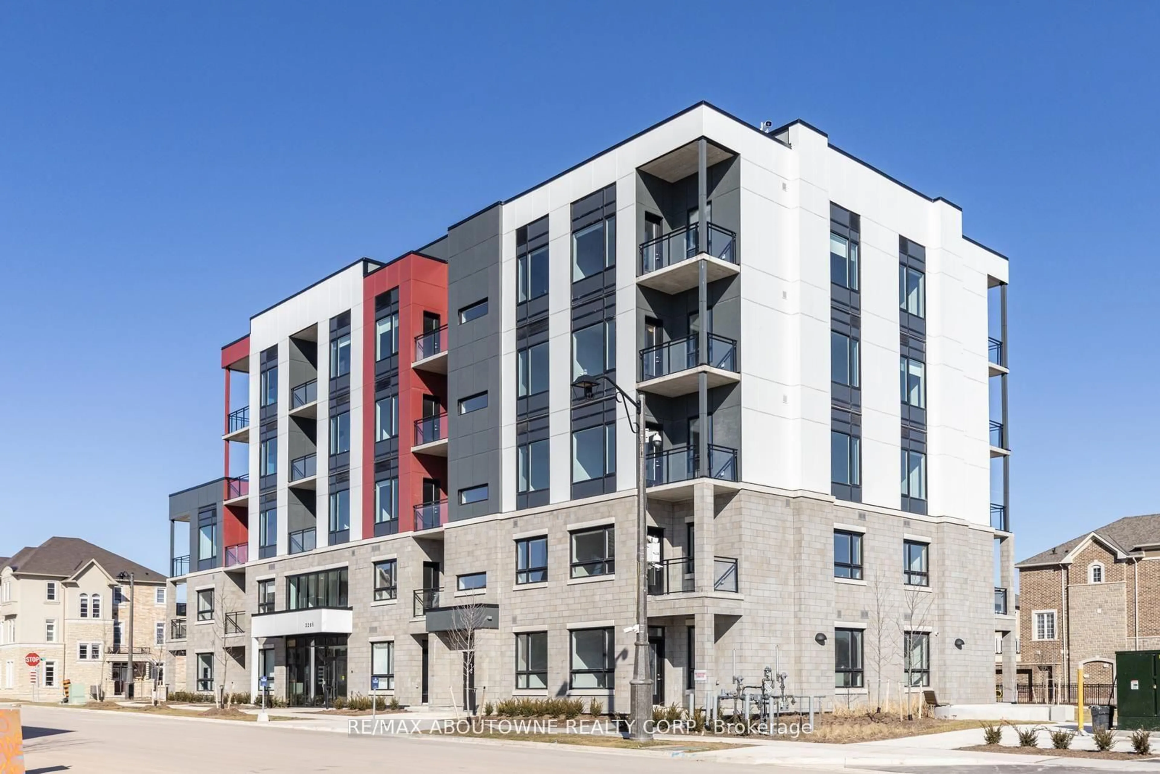 A pic from outside/outdoor area/front of a property/back of a property/a pic from drone, building for 3285 Carding Mill Tr #403, Oakville Ontario L6M 1S1