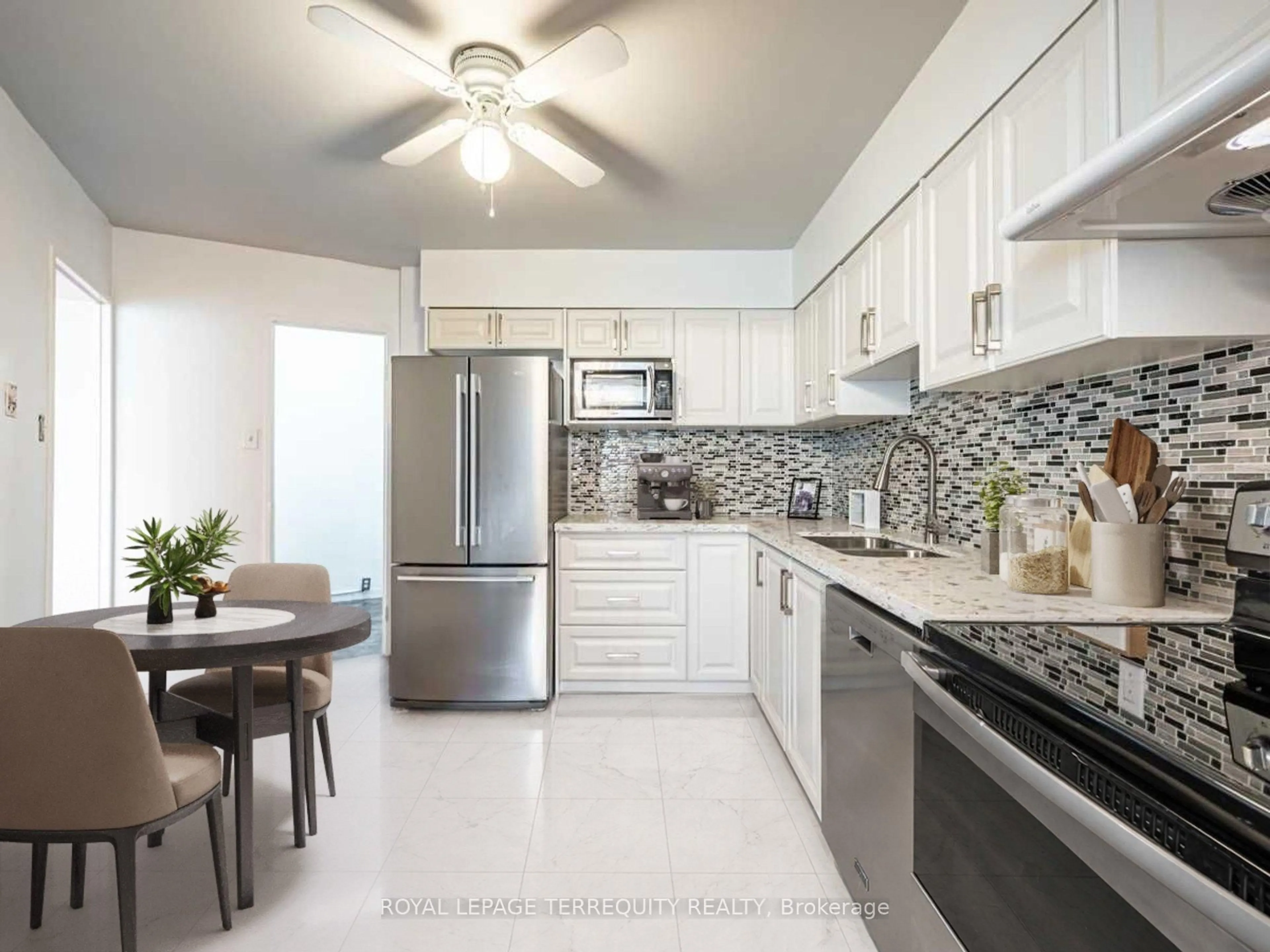 Open concept kitchen, ceramic/tile floor for 451 The West Mall #715, Toronto Ontario M9C 1G1