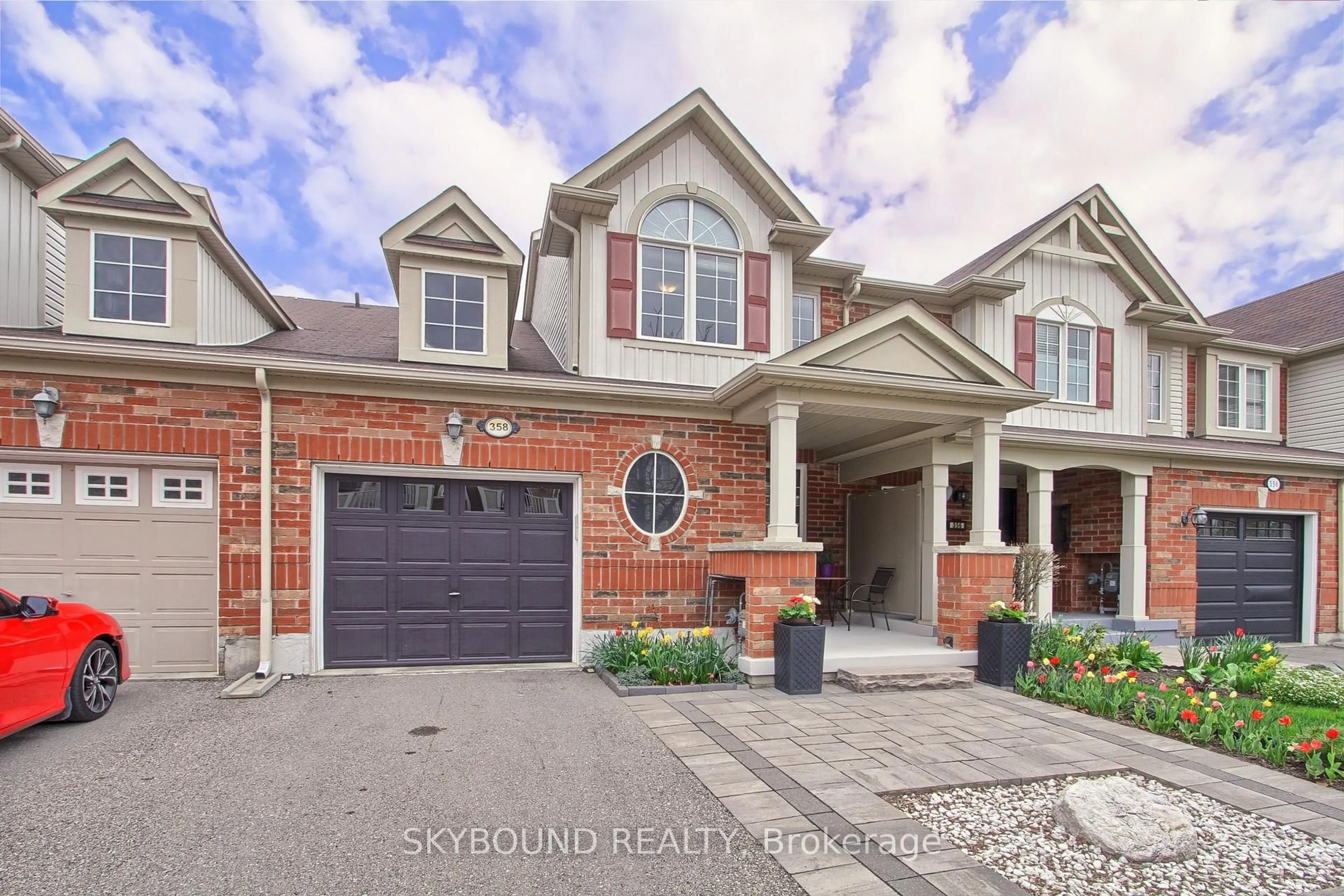 Home with brick exterior material, street for 358 Cavanagh Lane, Milton Ontario L9T 8J9