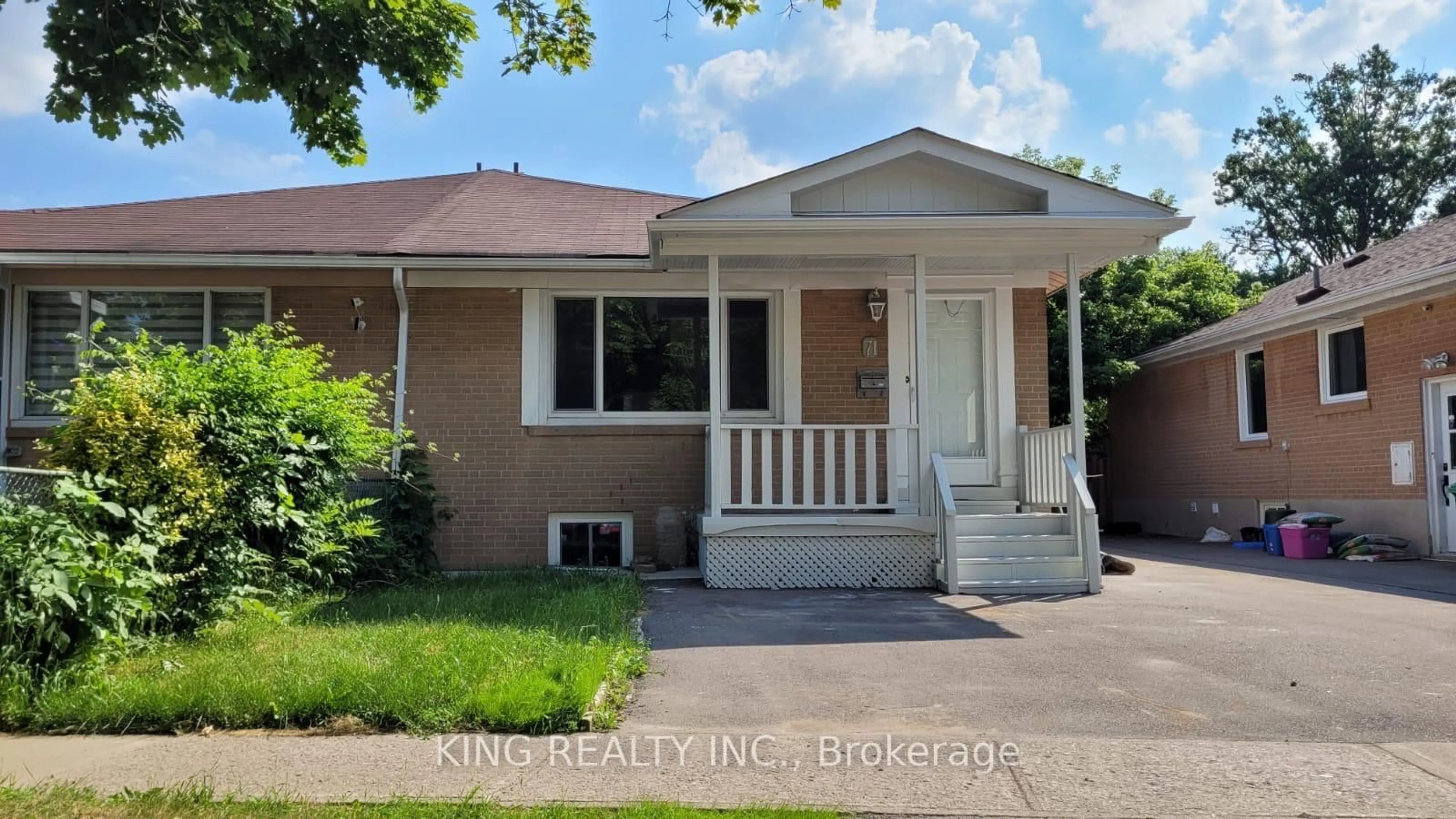 Home with vinyl exterior material, street for 71 Mcmurchy Ave, Brampton Ontario L6Y 1Y7