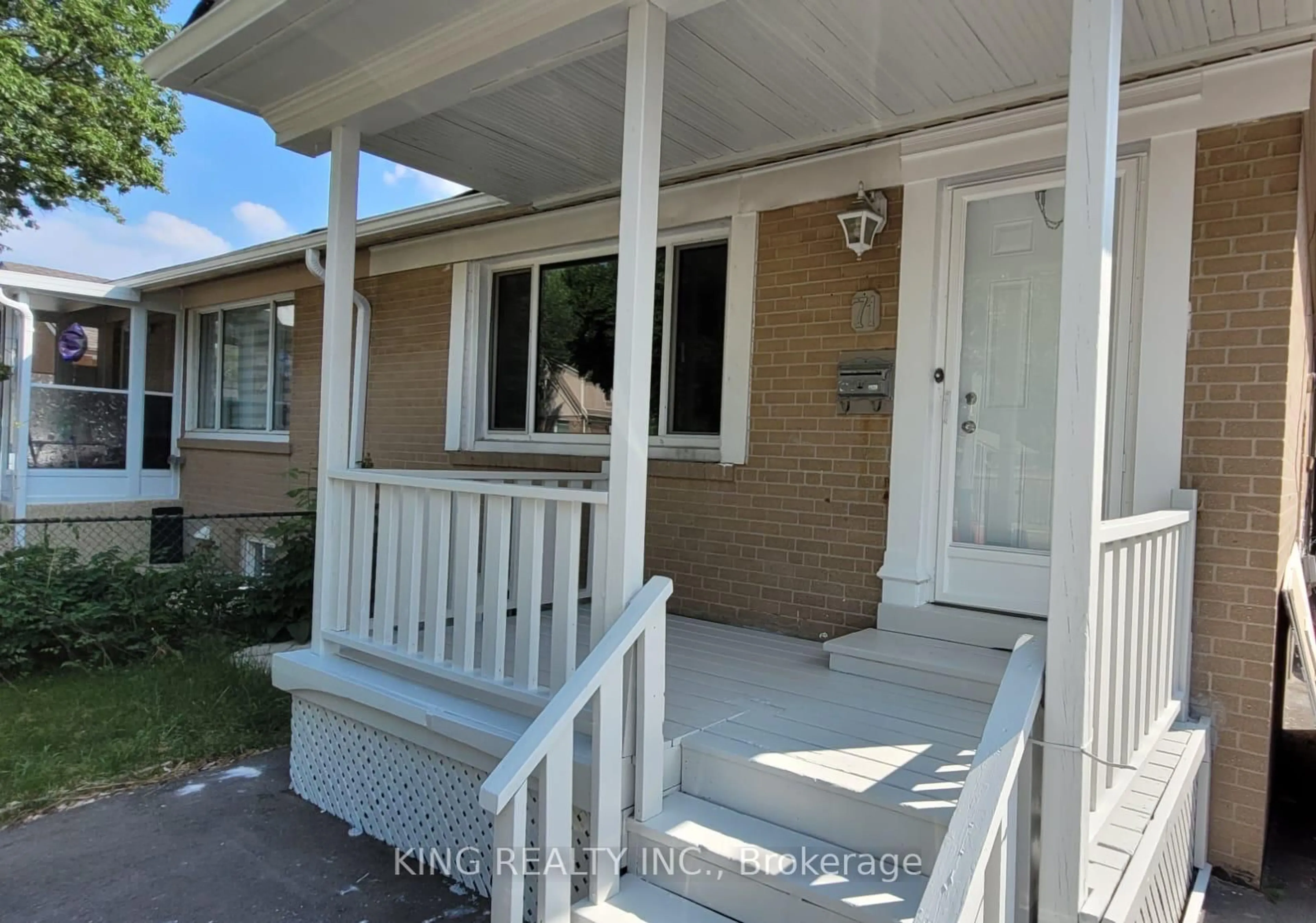Home with vinyl exterior material, street for 71 Mcmurchy Ave, Brampton Ontario L6Y 1Y7