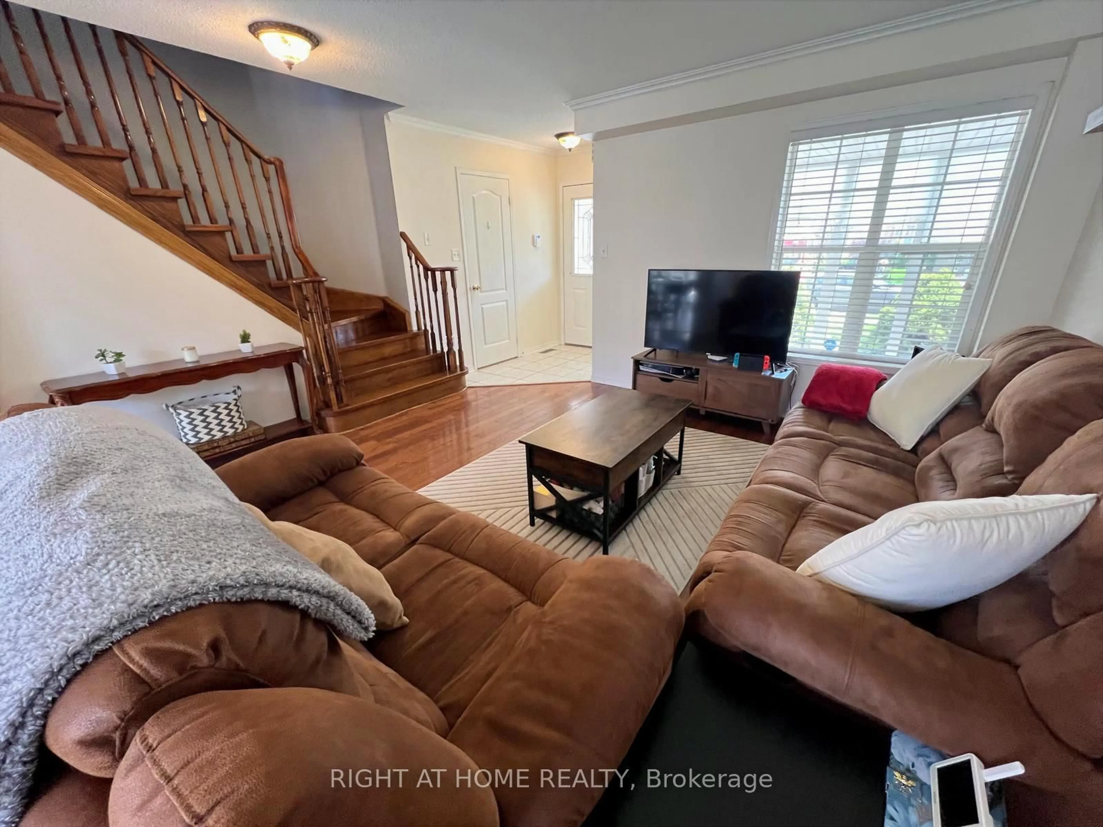 Living room with furniture, unknown for 10 Charleswood Circ, Brampton Ontario L7A 1Z1