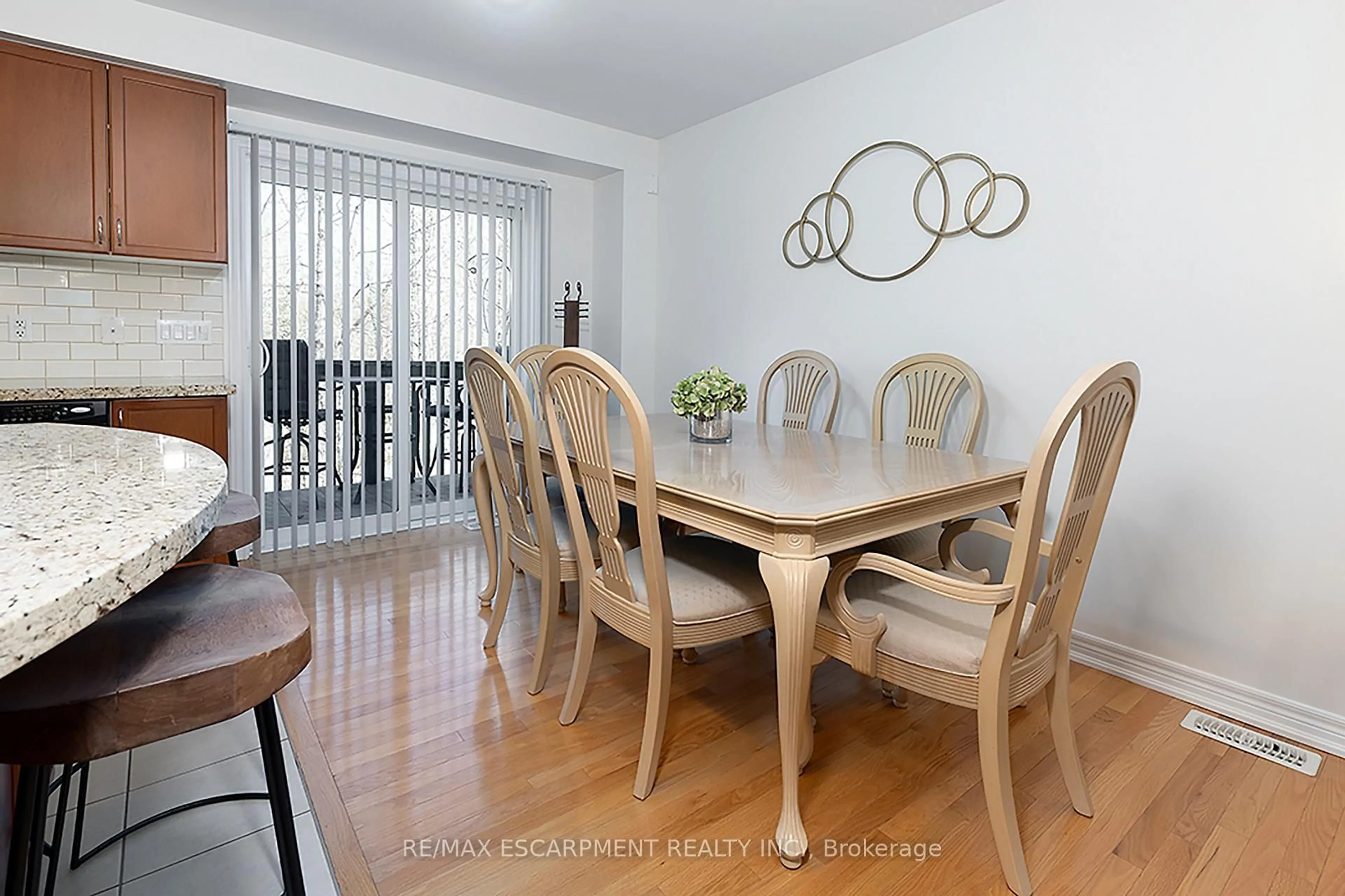 Dining room, wood/laminate floor for 233 Duskywing Way #25, Oakville Ontario L6L 0C5