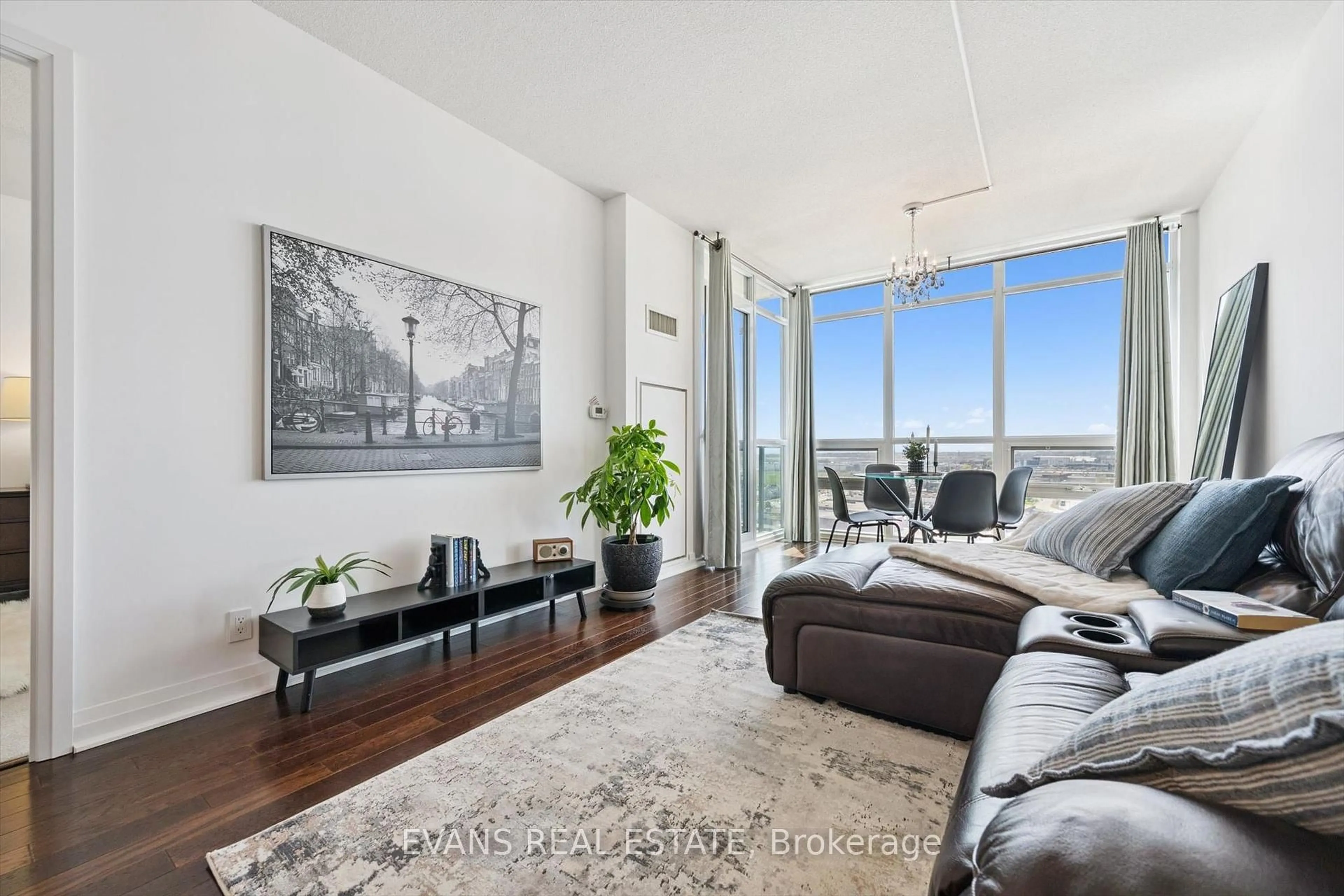 Living room with furniture, unknown for 1055 Southdown Rd #1411, Mississauga Ontario L5J 0A3