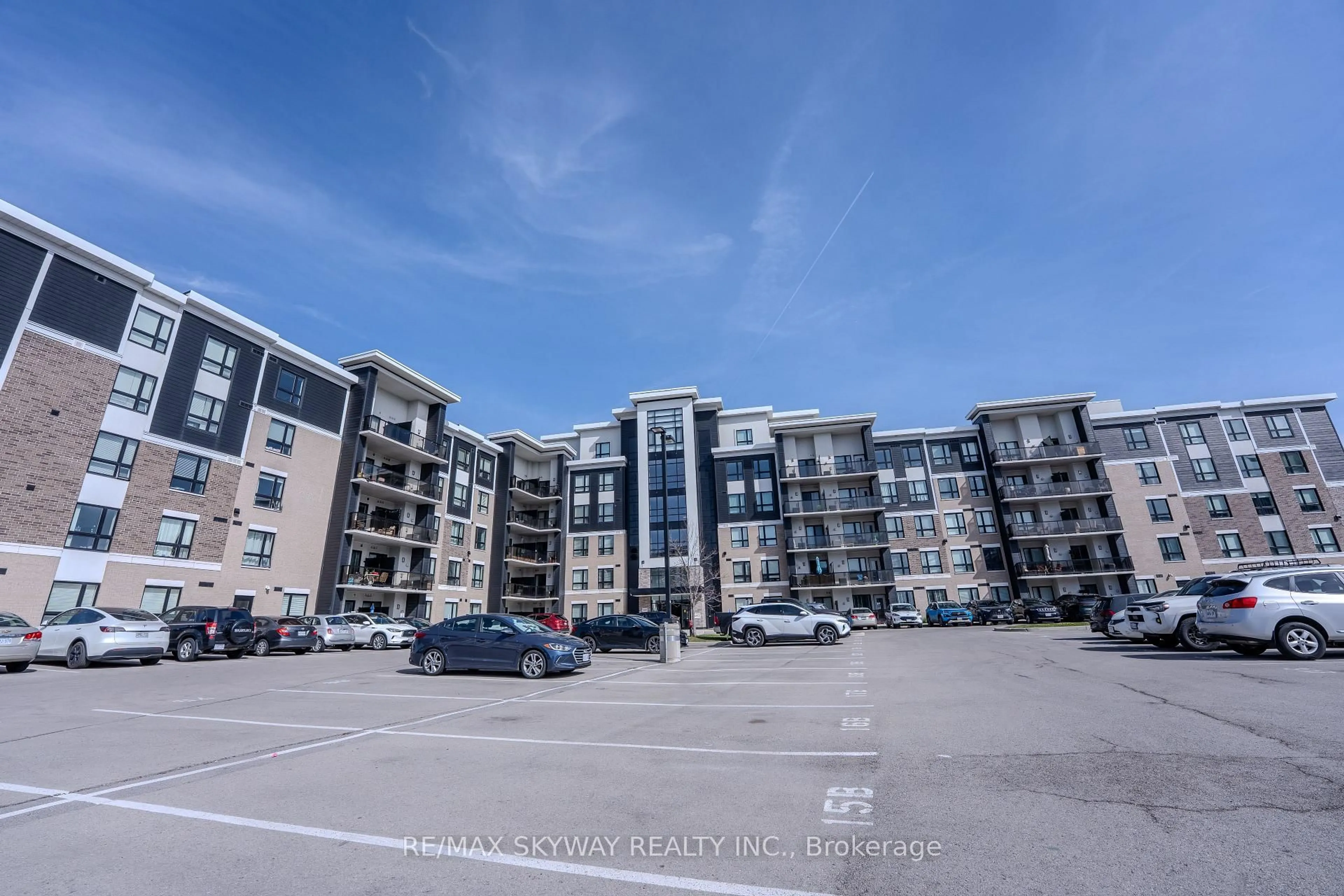 A pic from outside/outdoor area/front of a property/back of a property/a pic from drone, unknown for 640 Sauve St #420, Milton Ontario L9T 9A7