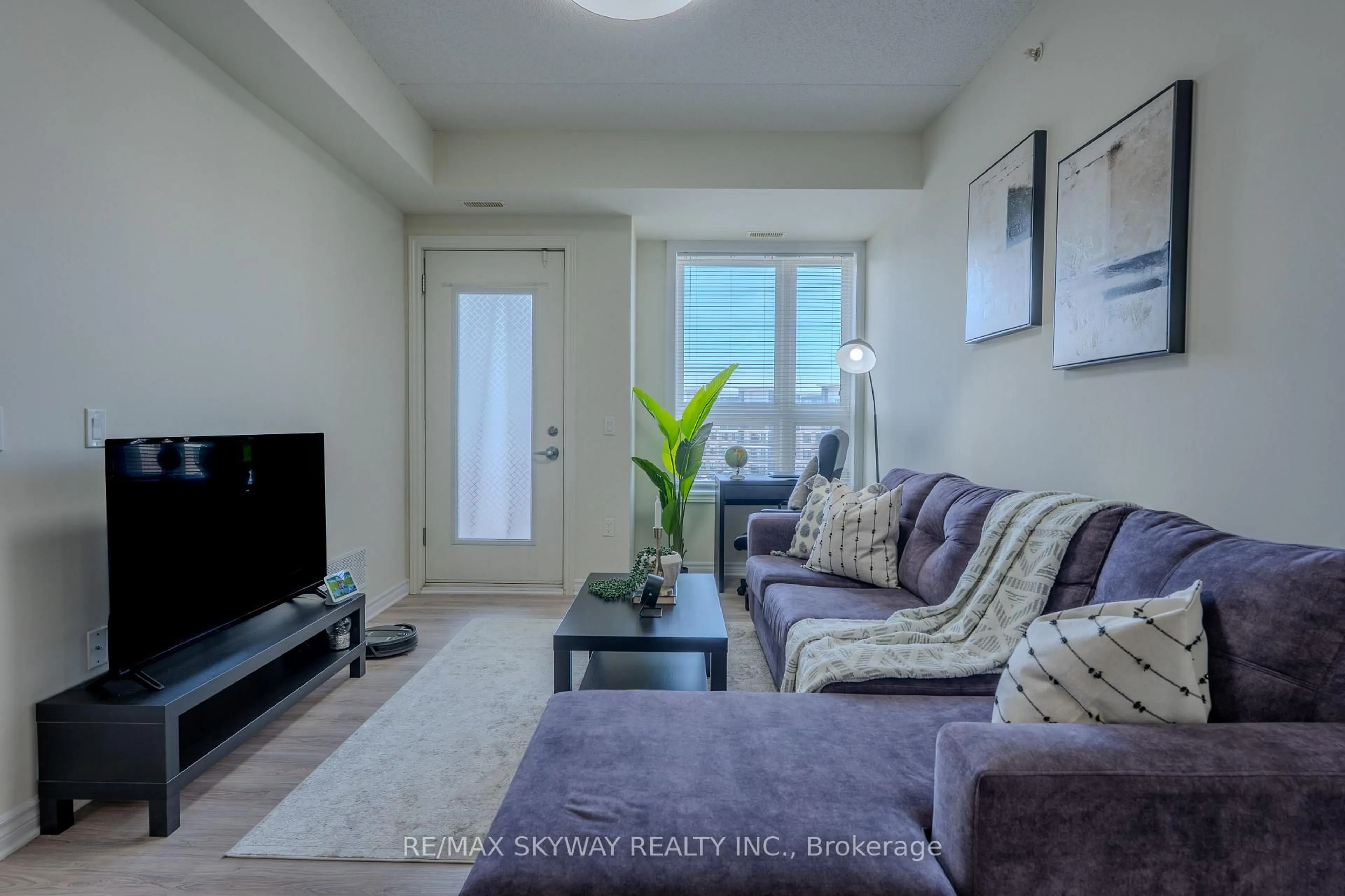 Living room with furniture, unknown for 640 Sauve St #420, Milton Ontario L9T 9A7