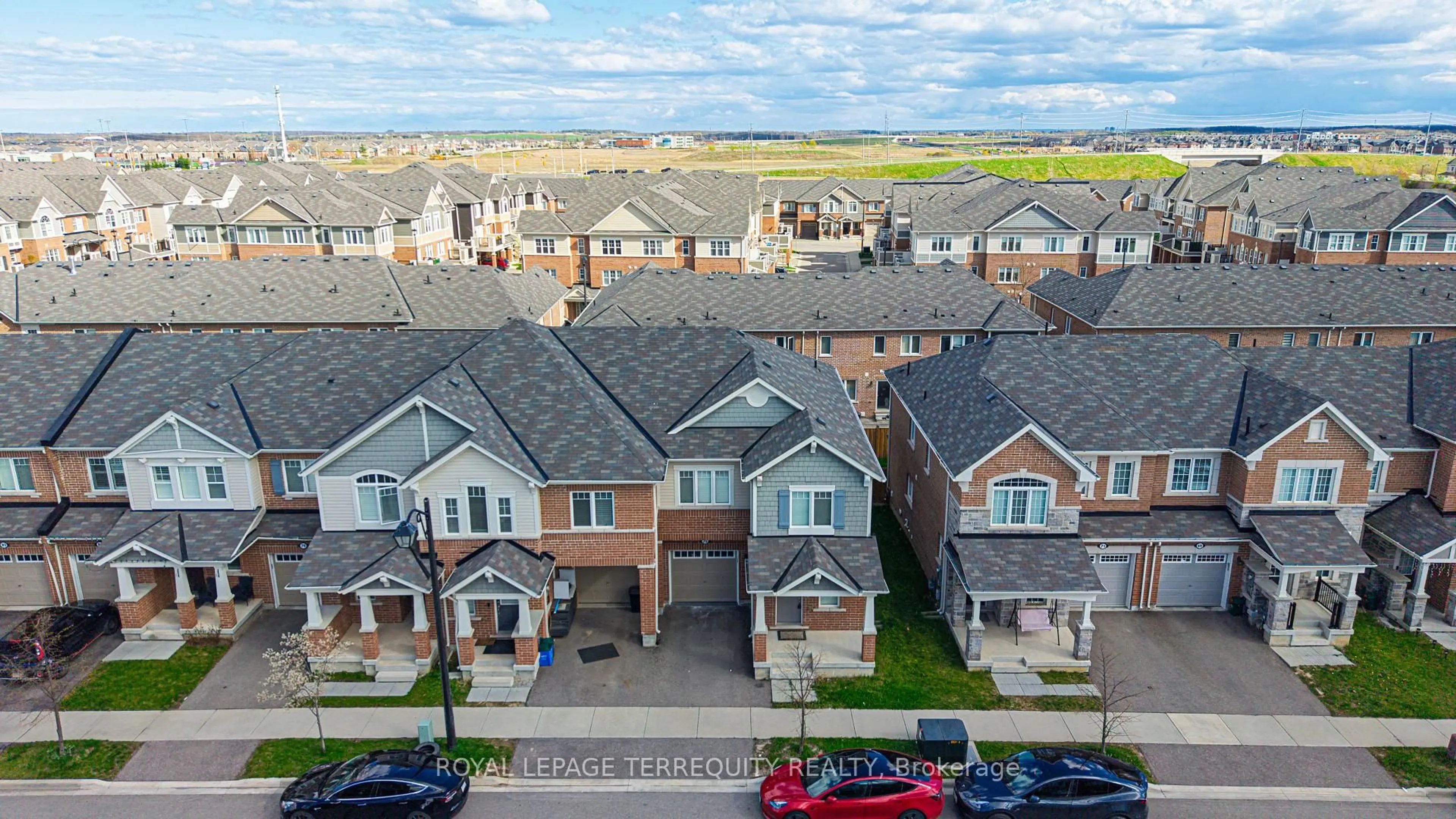 A pic from outside/outdoor area/front of a property/back of a property/a pic from drone, city buildings view from balcony for 75 Reichert Crt, Milton Ontario L9T 8R6
