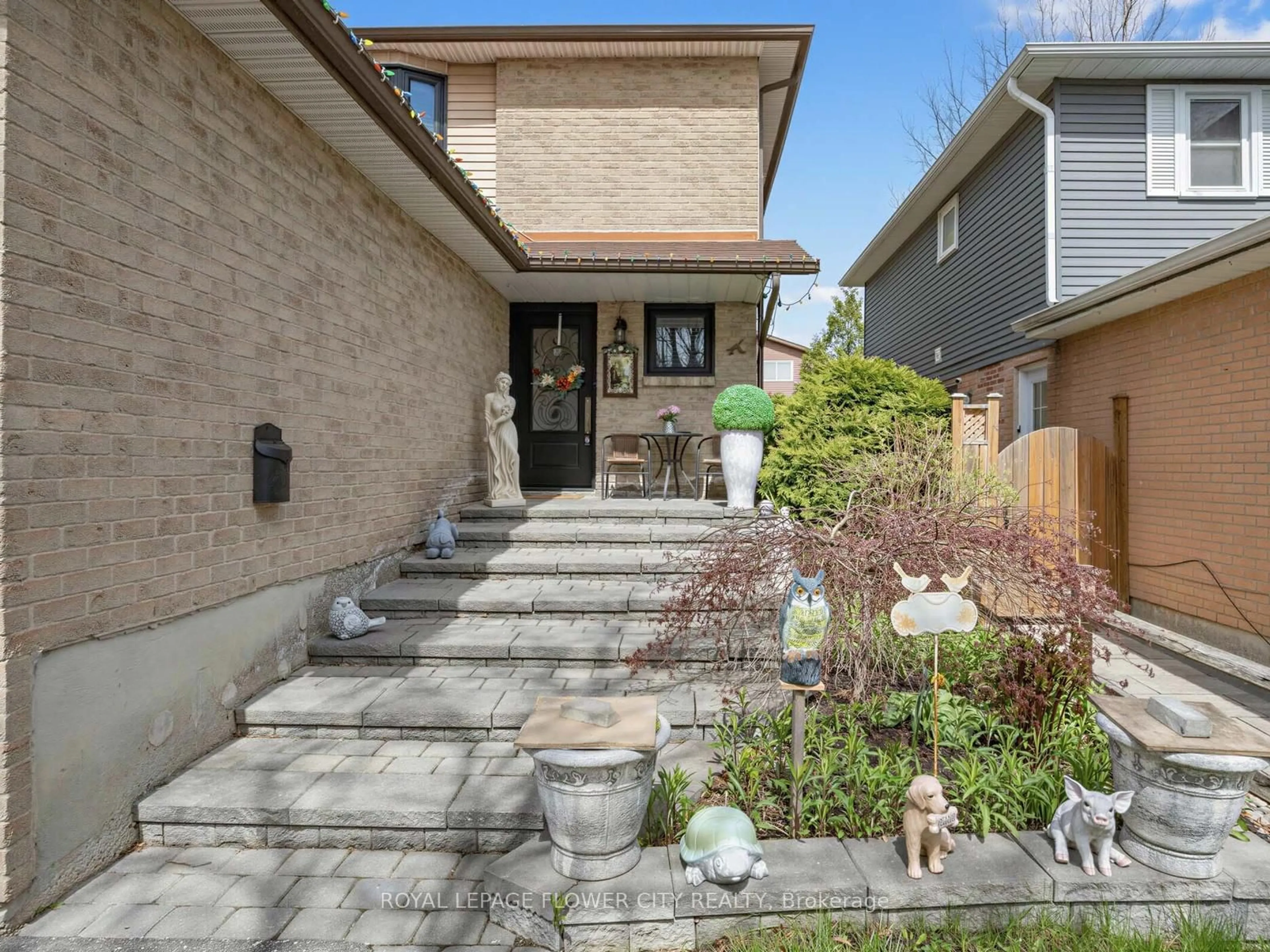 Home with brick exterior material, street for 16 Blossom Ave, Brampton Ontario L6X 2W3