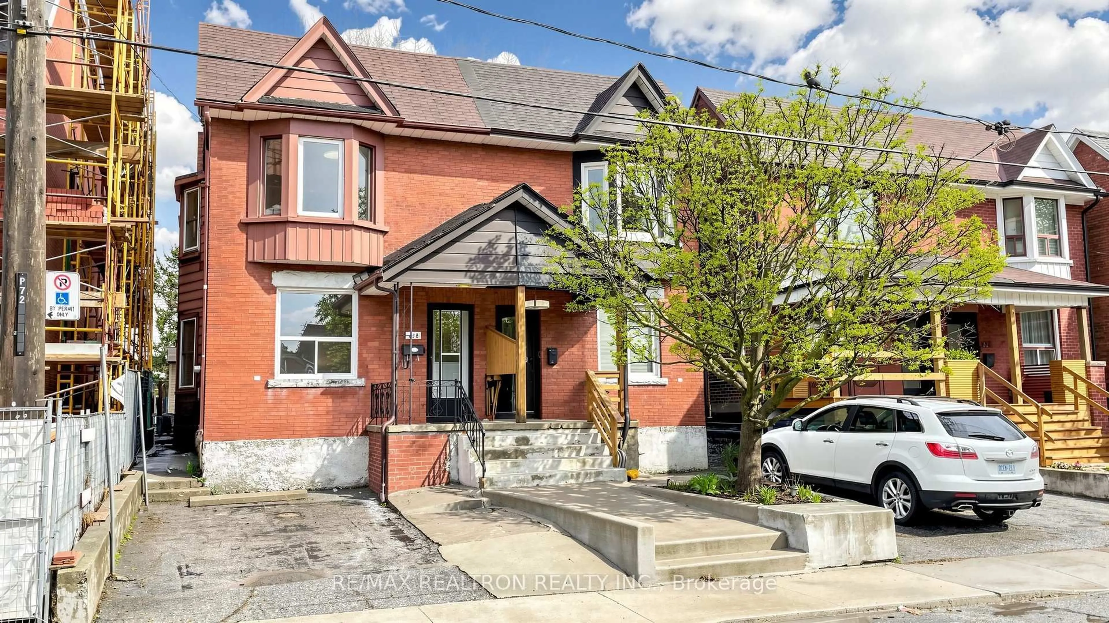 Home with brick exterior material, street for 318 Westmoreland Ave, Toronto Ontario M6H 3A5