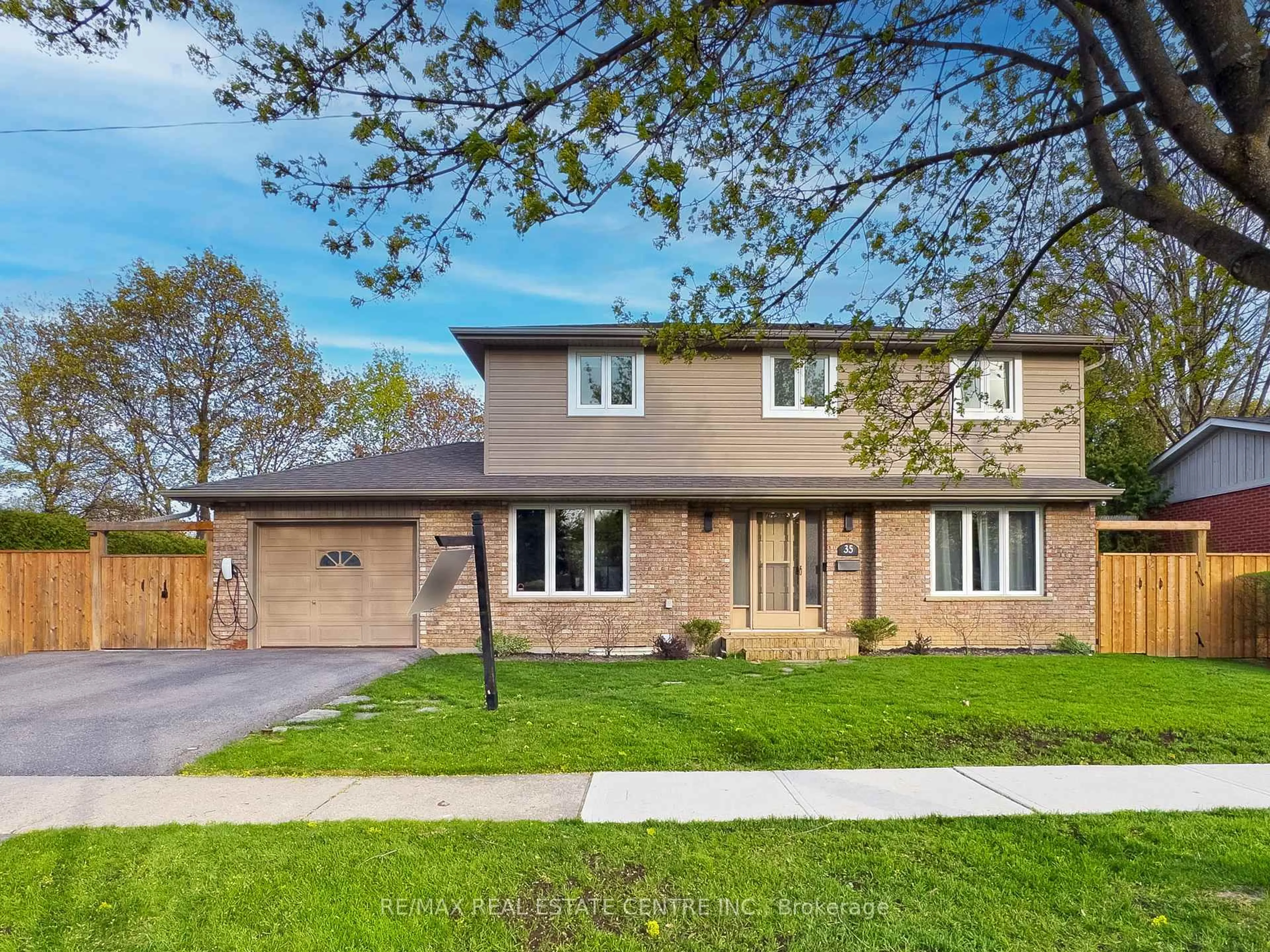 Home with brick exterior material, street for 35 Treleaven Dr, Brampton Ontario L6Y 1X7