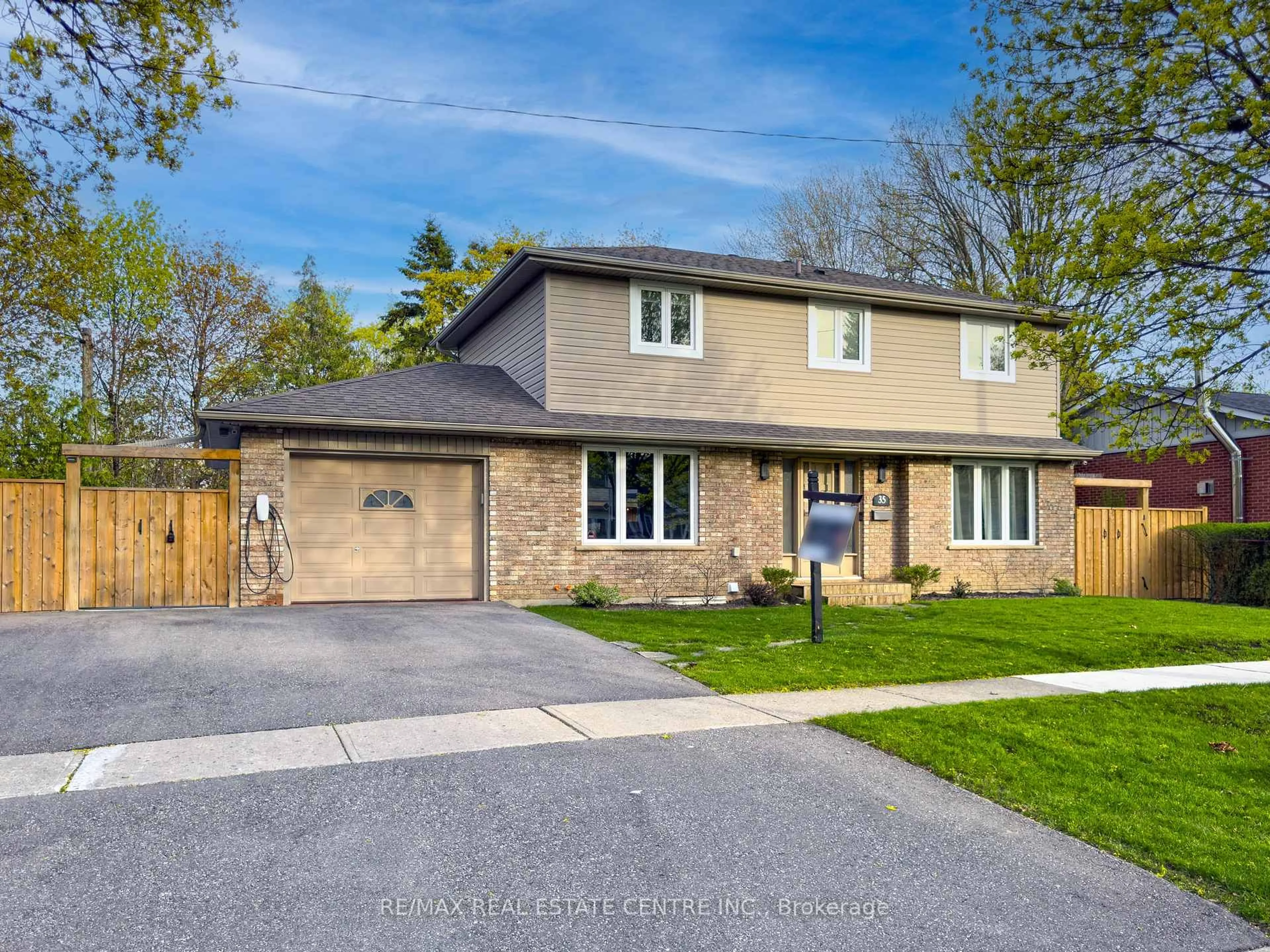 Home with brick exterior material, street for 35 Treleaven Dr, Brampton Ontario L6Y 1X7