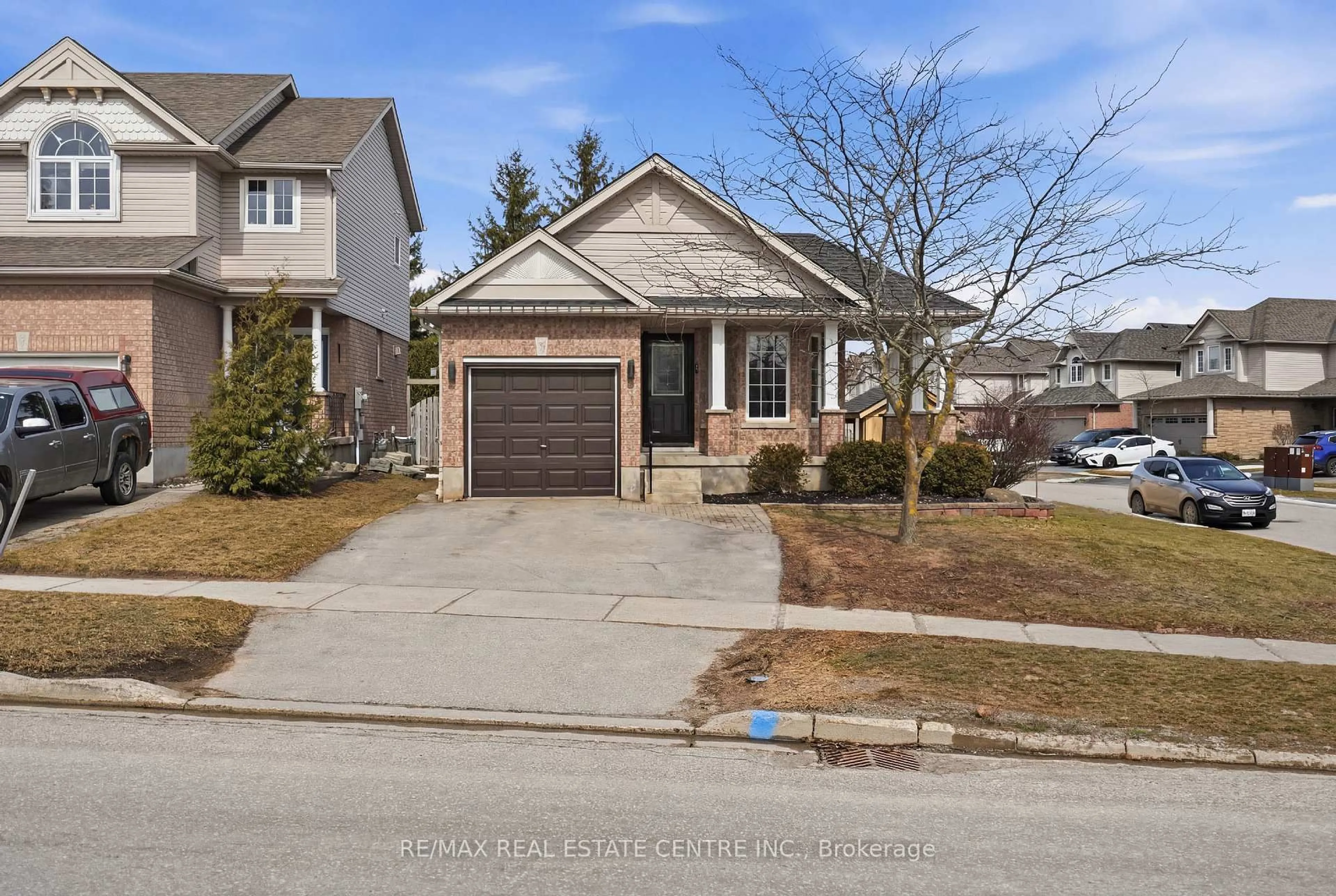 Home with brick exterior material, street for 321 Montgomery Blvd, Orangeville Ontario L9W 5G7