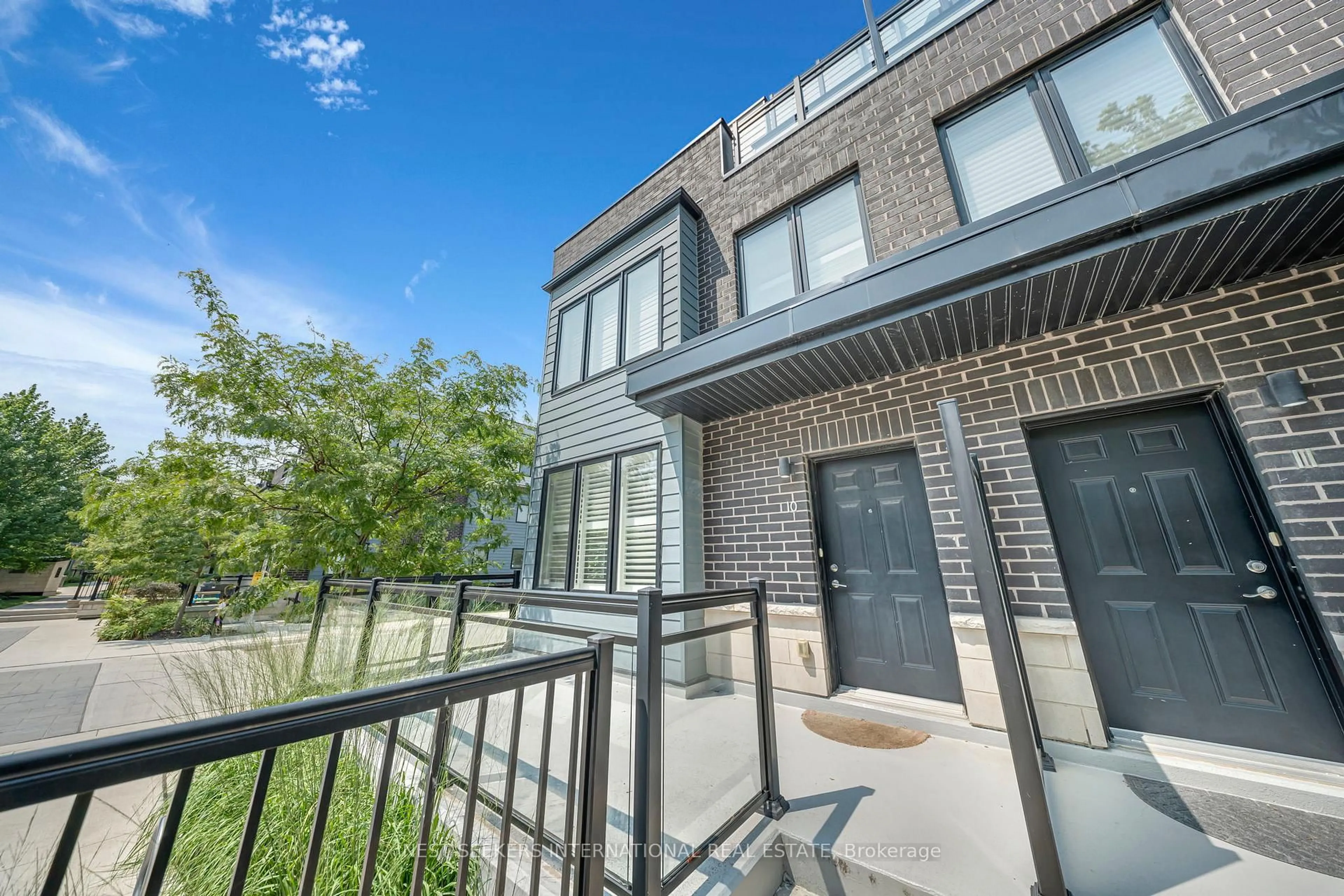 Home with brick exterior material, street for 2212 Bromsgrove Rd #10, Mississauga Ontario L5J 1L4