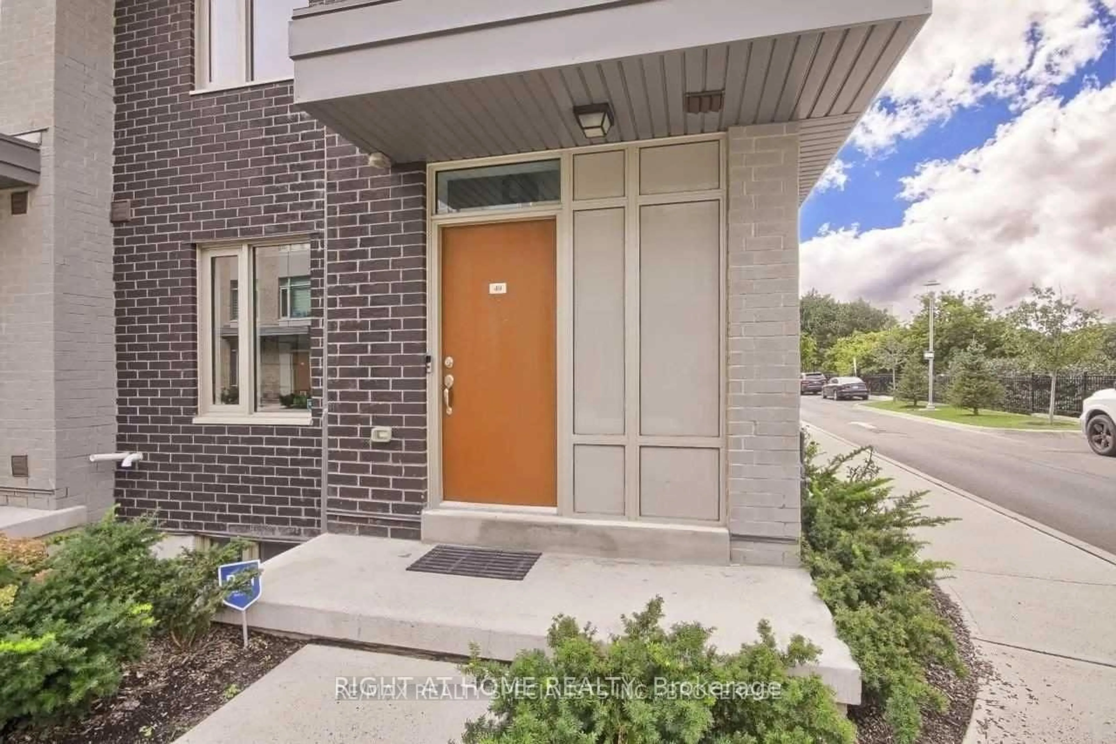 Home with brick exterior material, street for 26 Applewood Lane #49, Toronto Ontario M9C 0C1