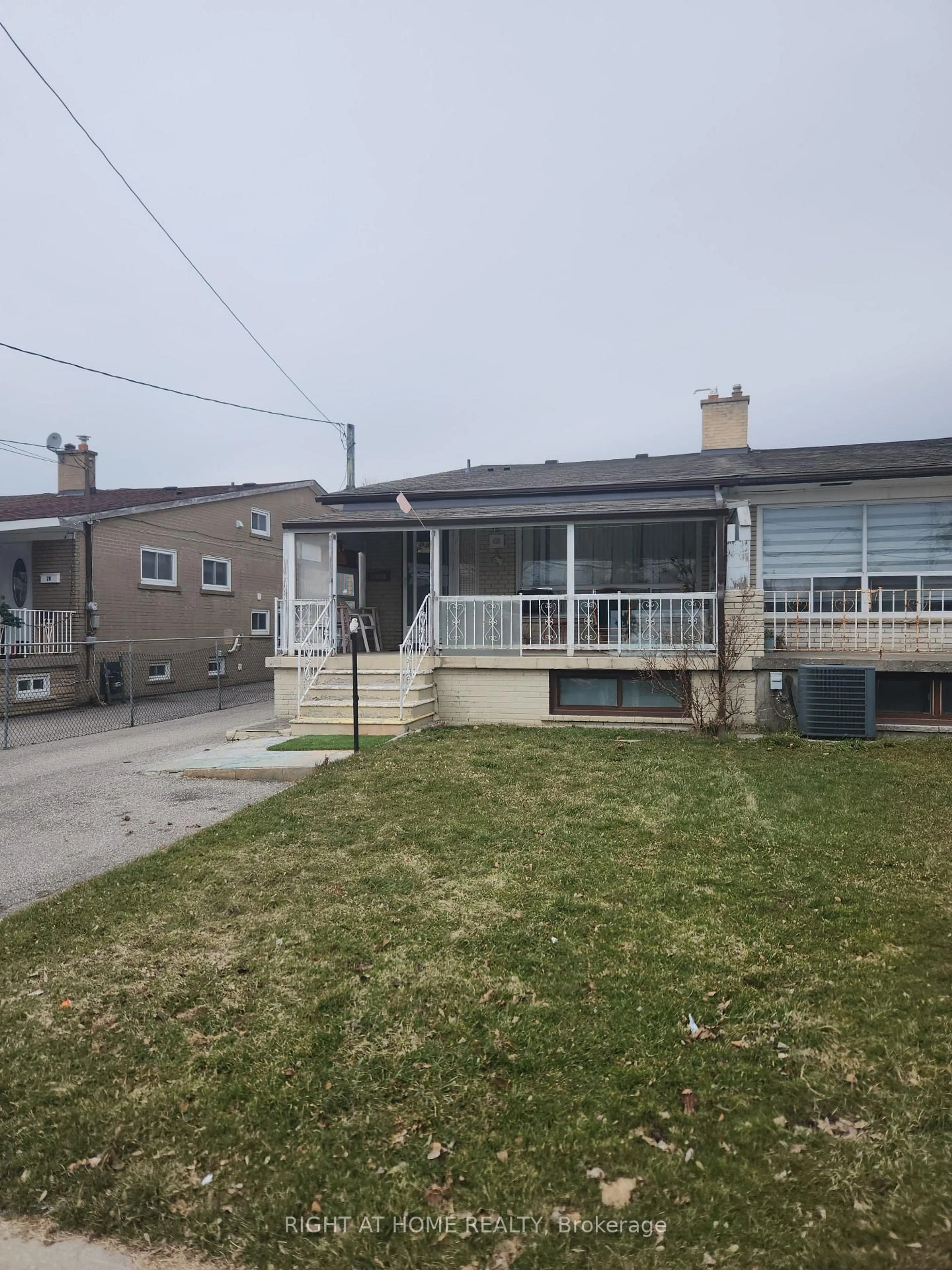 A pic from outside/outdoor area/front of a property/back of a property/a pic from drone, street for 68 Lanyard Rd, Toronto Ontario M9M 1Y9